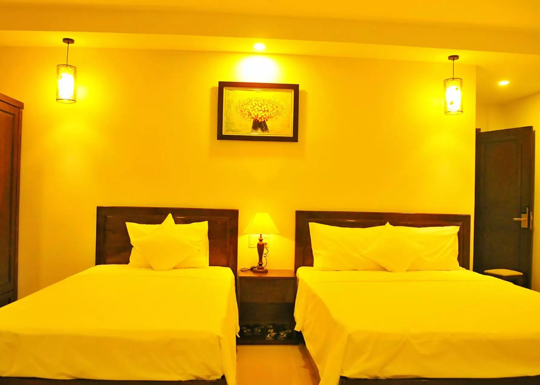 Bed in Aries Hotel