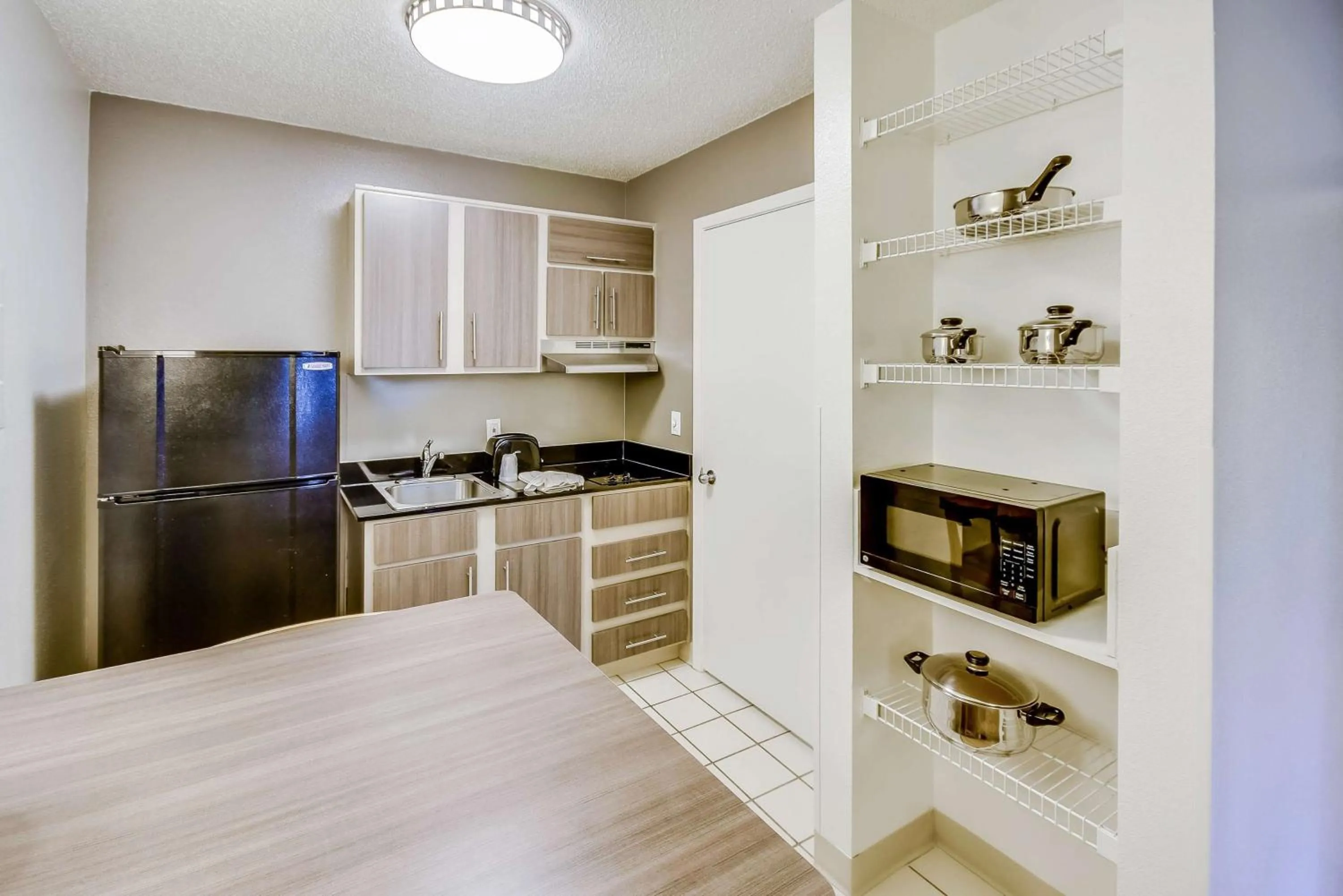 Kitchen or kitchenette in Studio 6-Houston, TX - Hobby South
