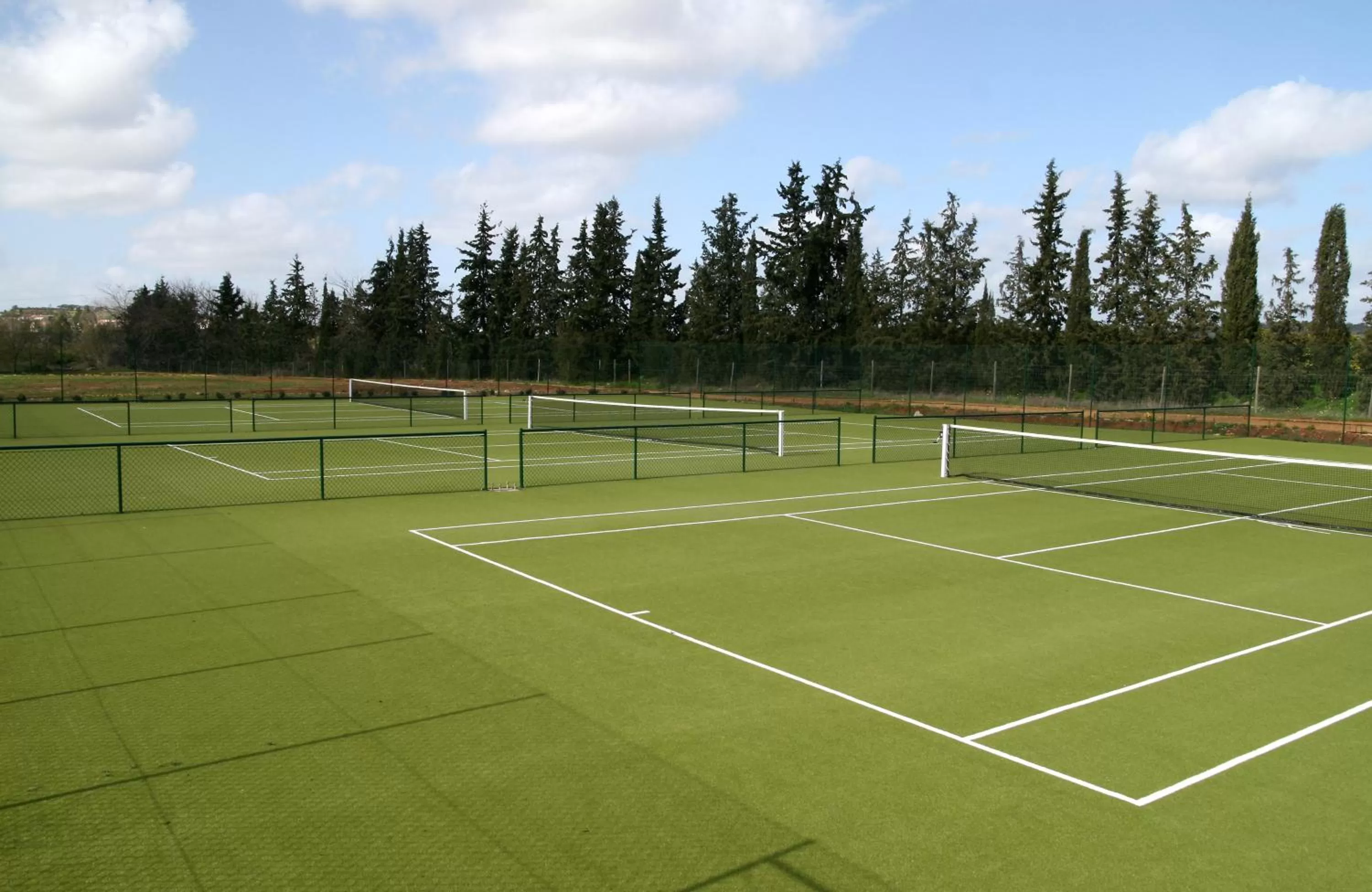 Tennis court in Amendoeira Golf Resort