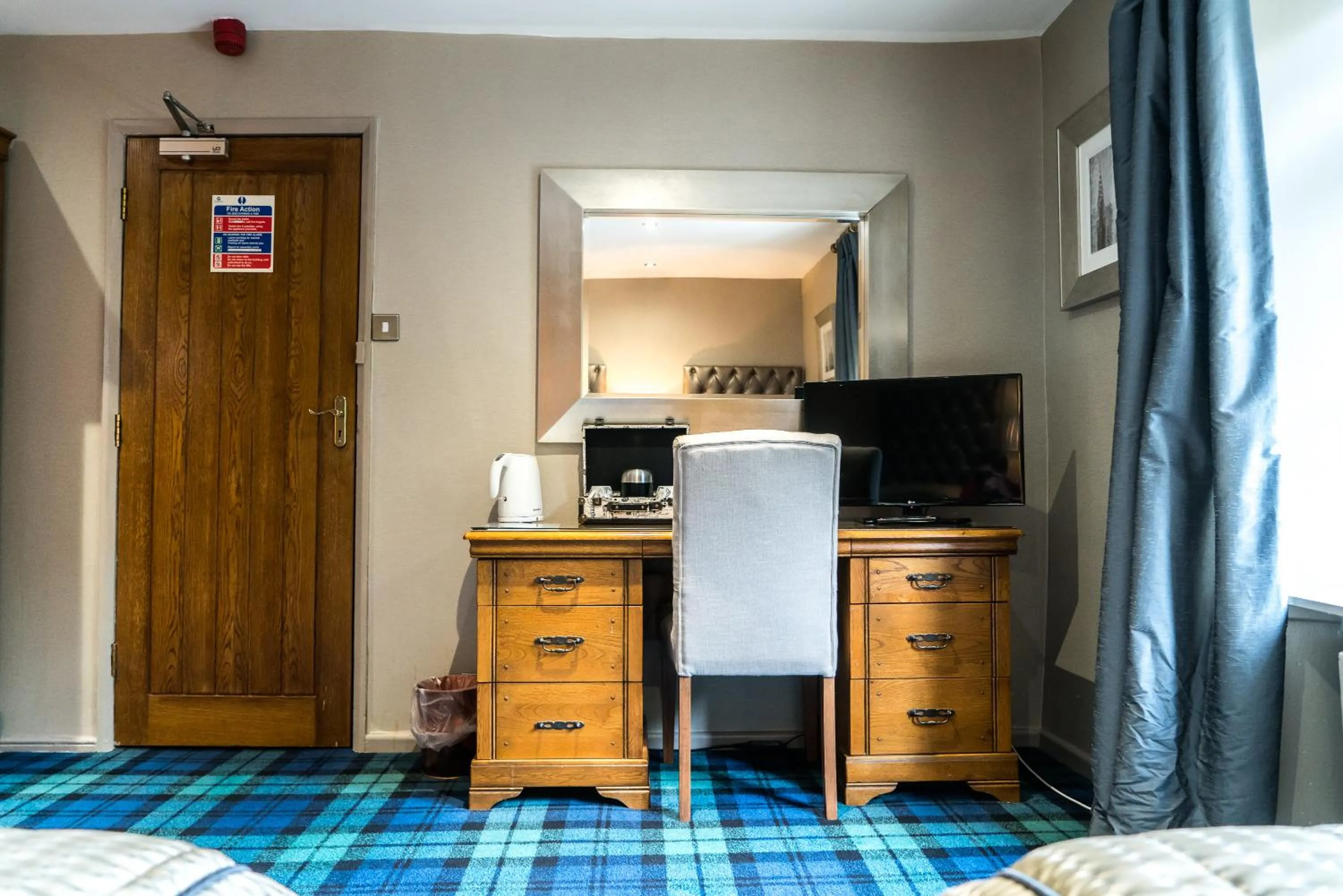 Bed in The Mews Hotel