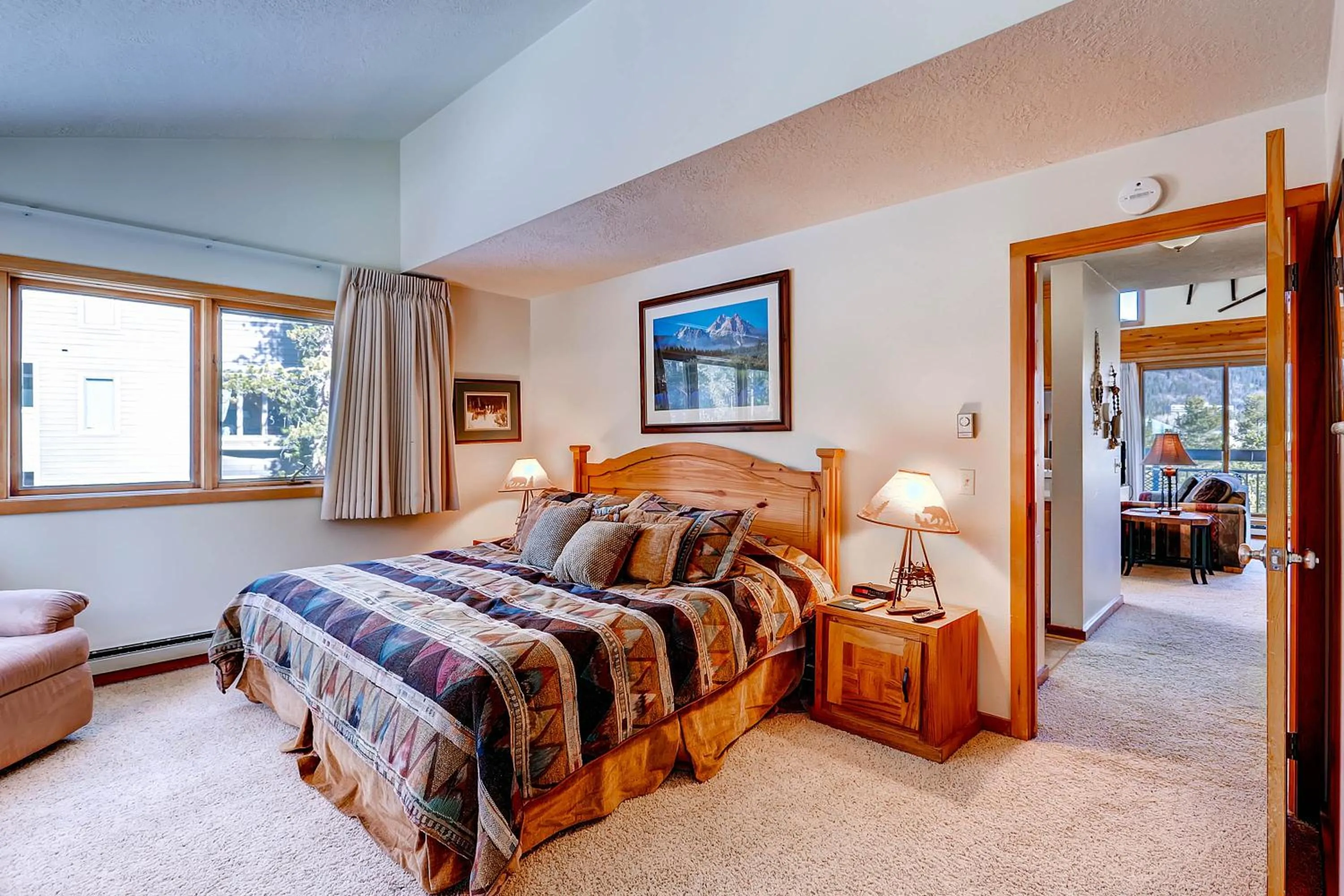 Bed in Evergreen Condominiums by Vail Resorts