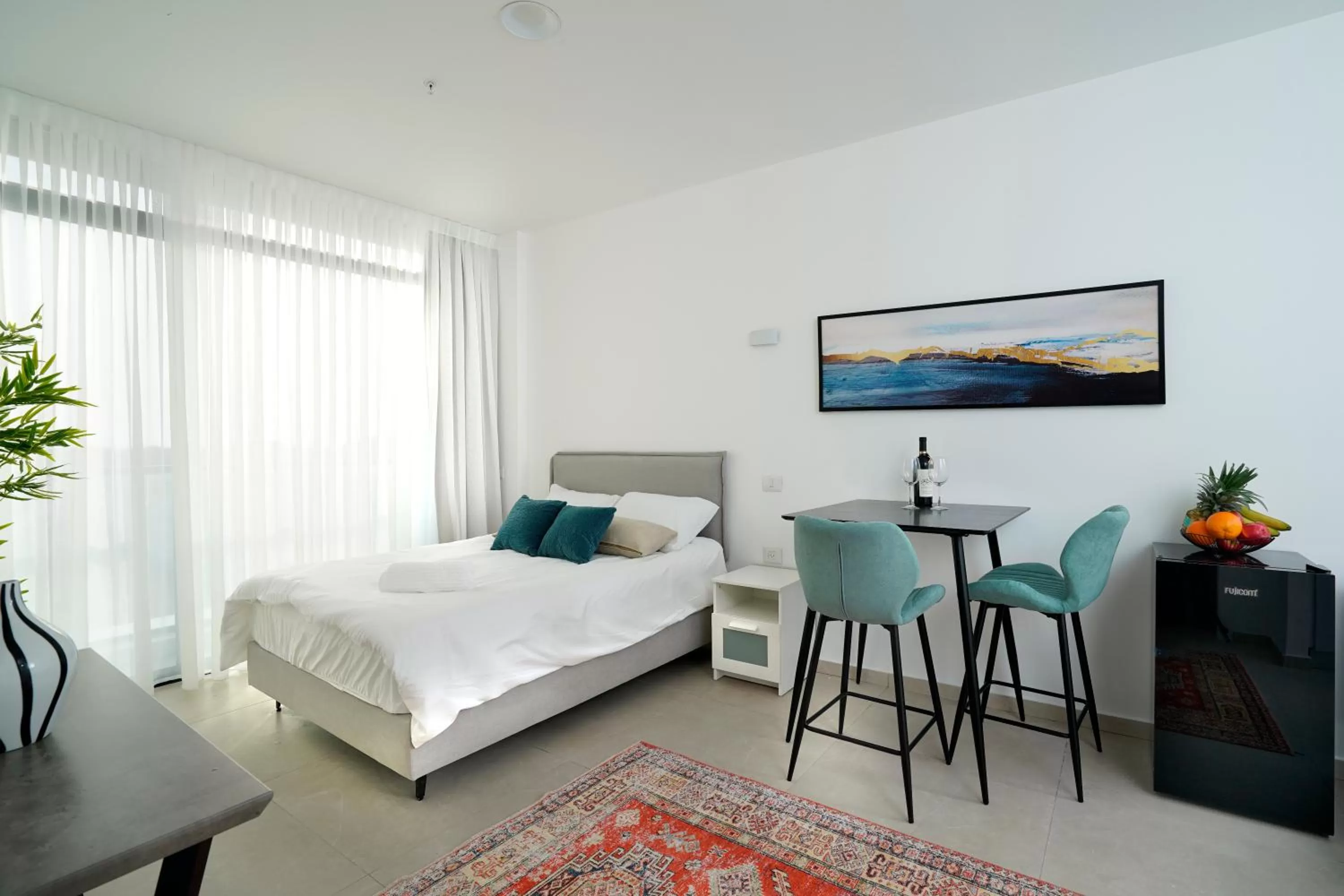 Bed in Hi-Yam SeaView Apartments & Suites