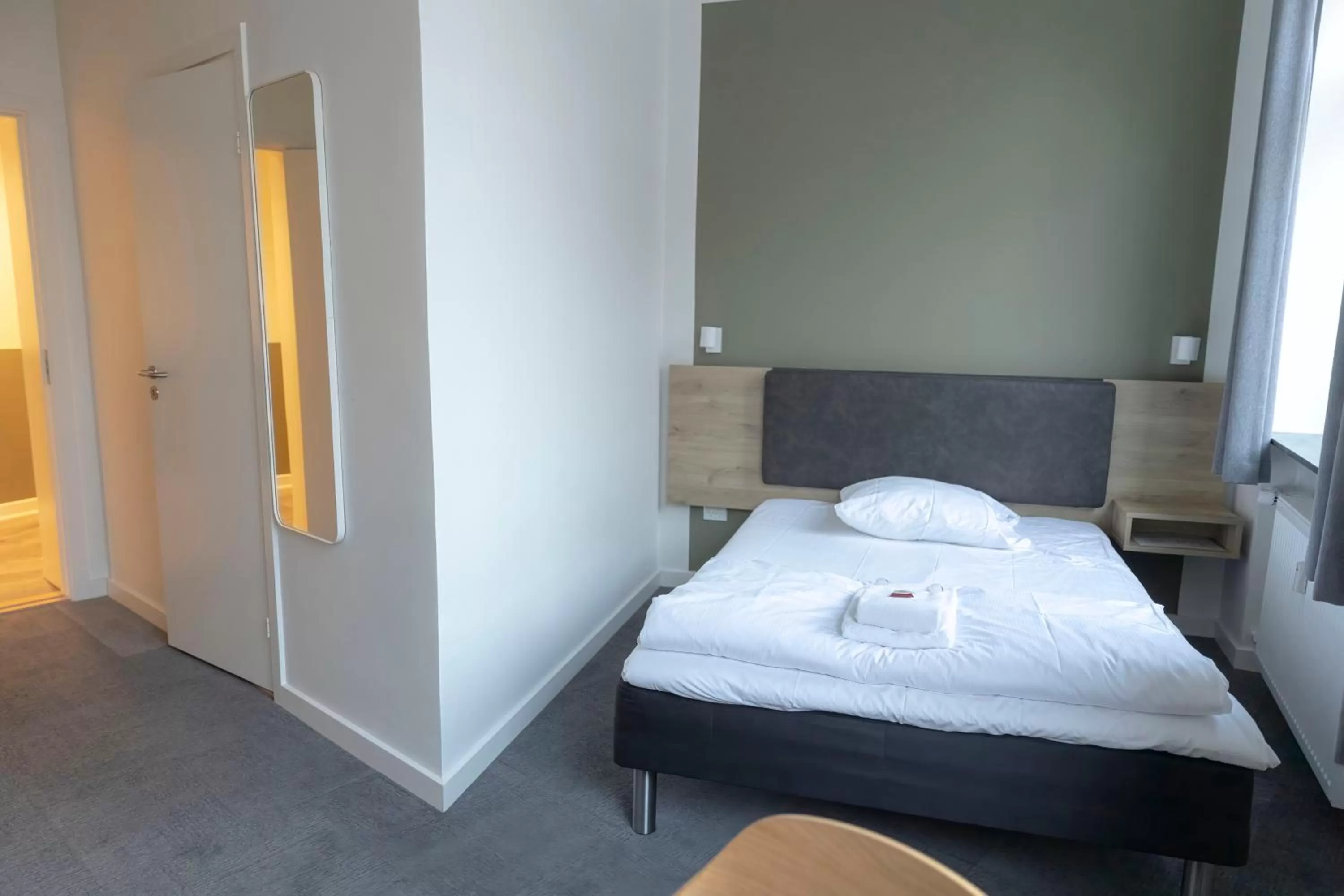 Bed in Hotel Harmonien