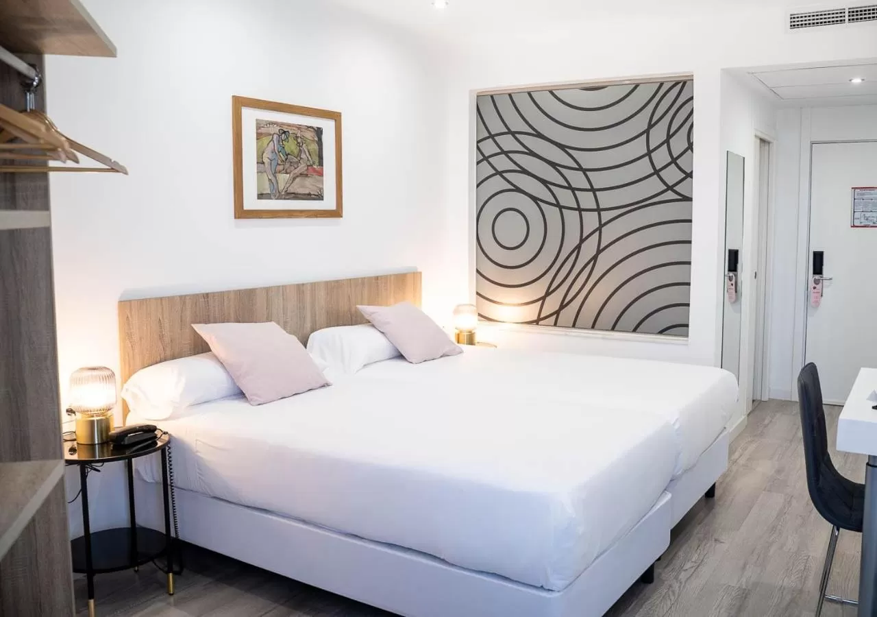 Bed in Hotel Pasarela