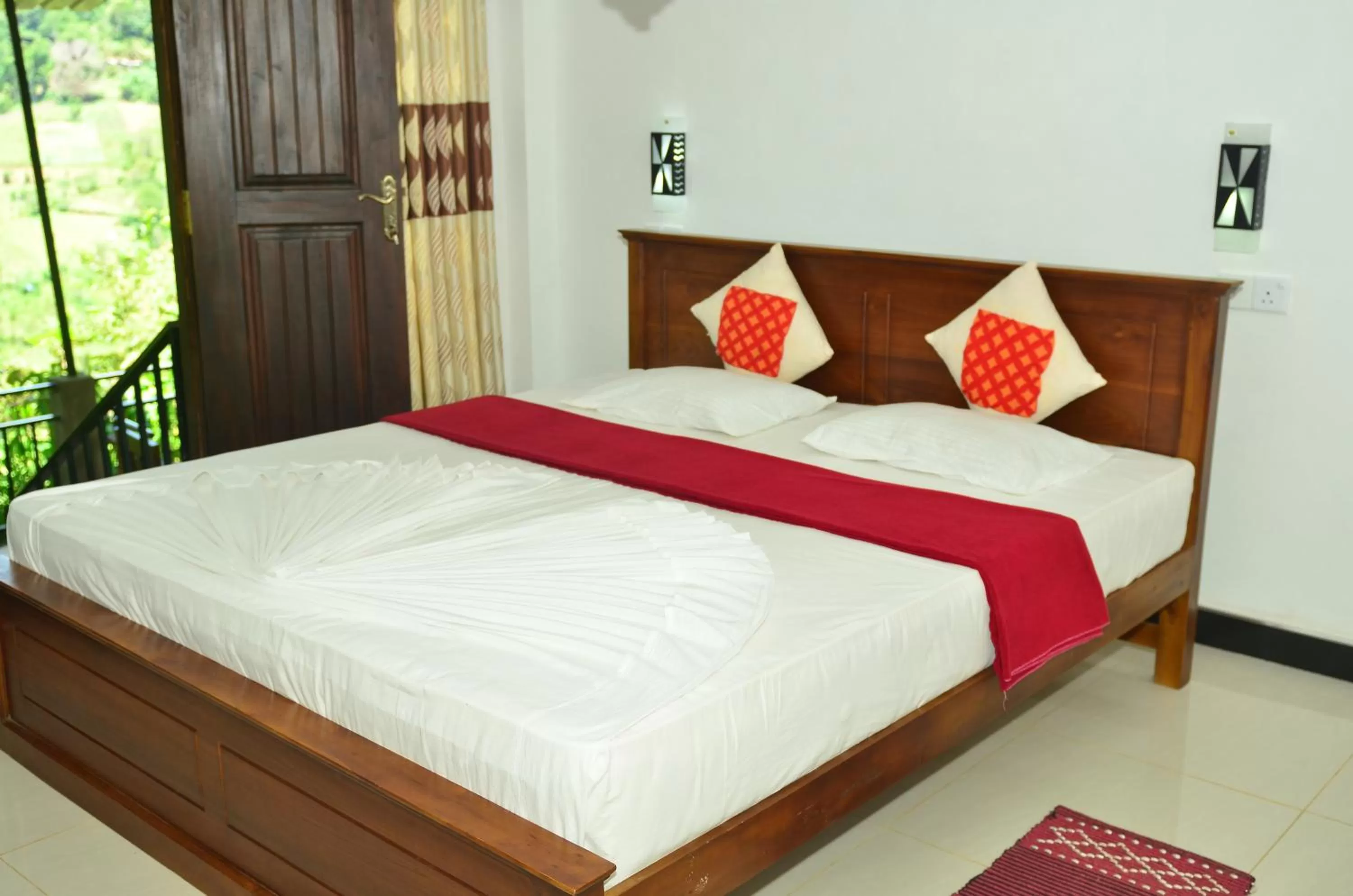 Bed in Dimuthu Home Stay