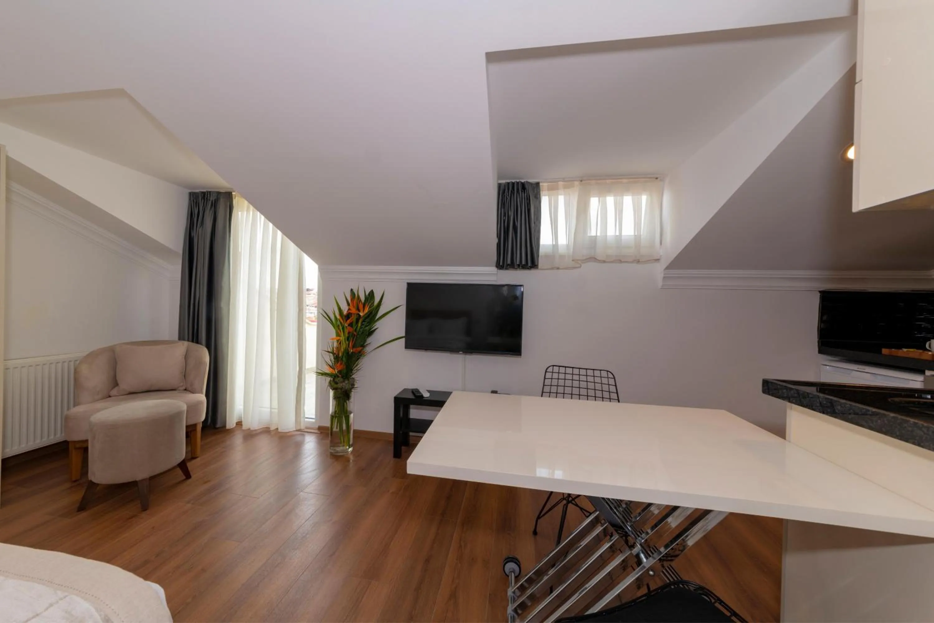 Kitchen or kitchenette in Joy Suites