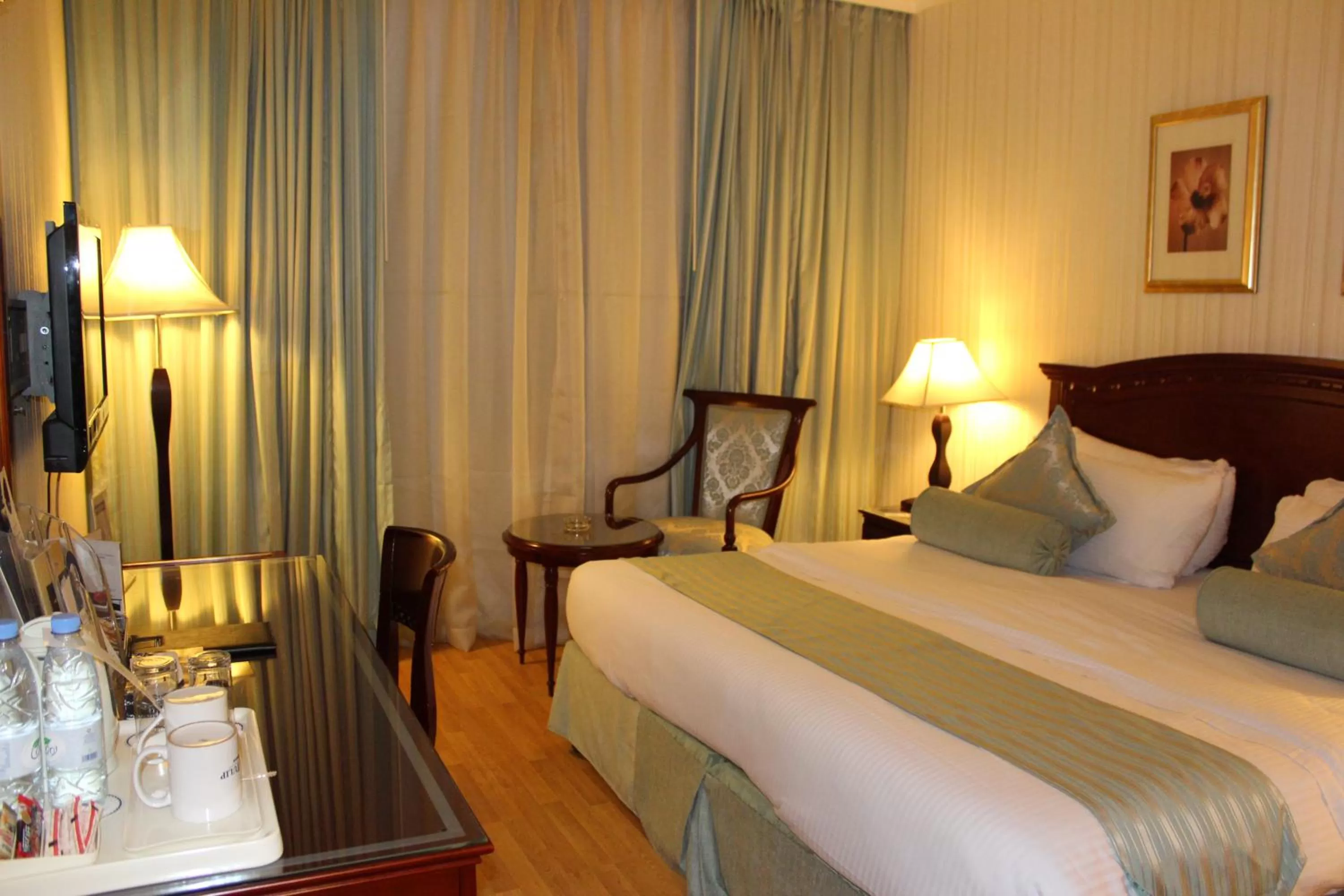 Bed in Swiss Al Hamra Hotel