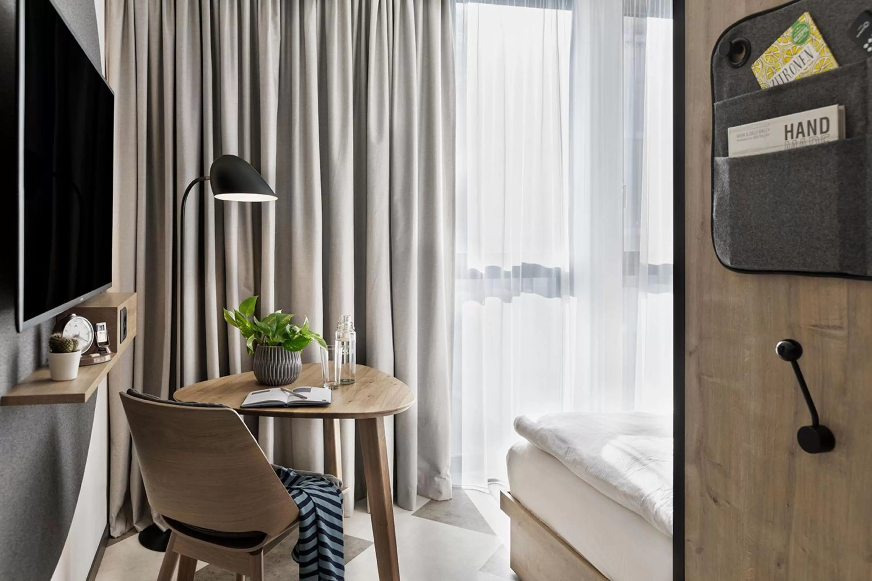 Seating area, Bed in Stay KooooK Bern Wankdorf - Online Check In