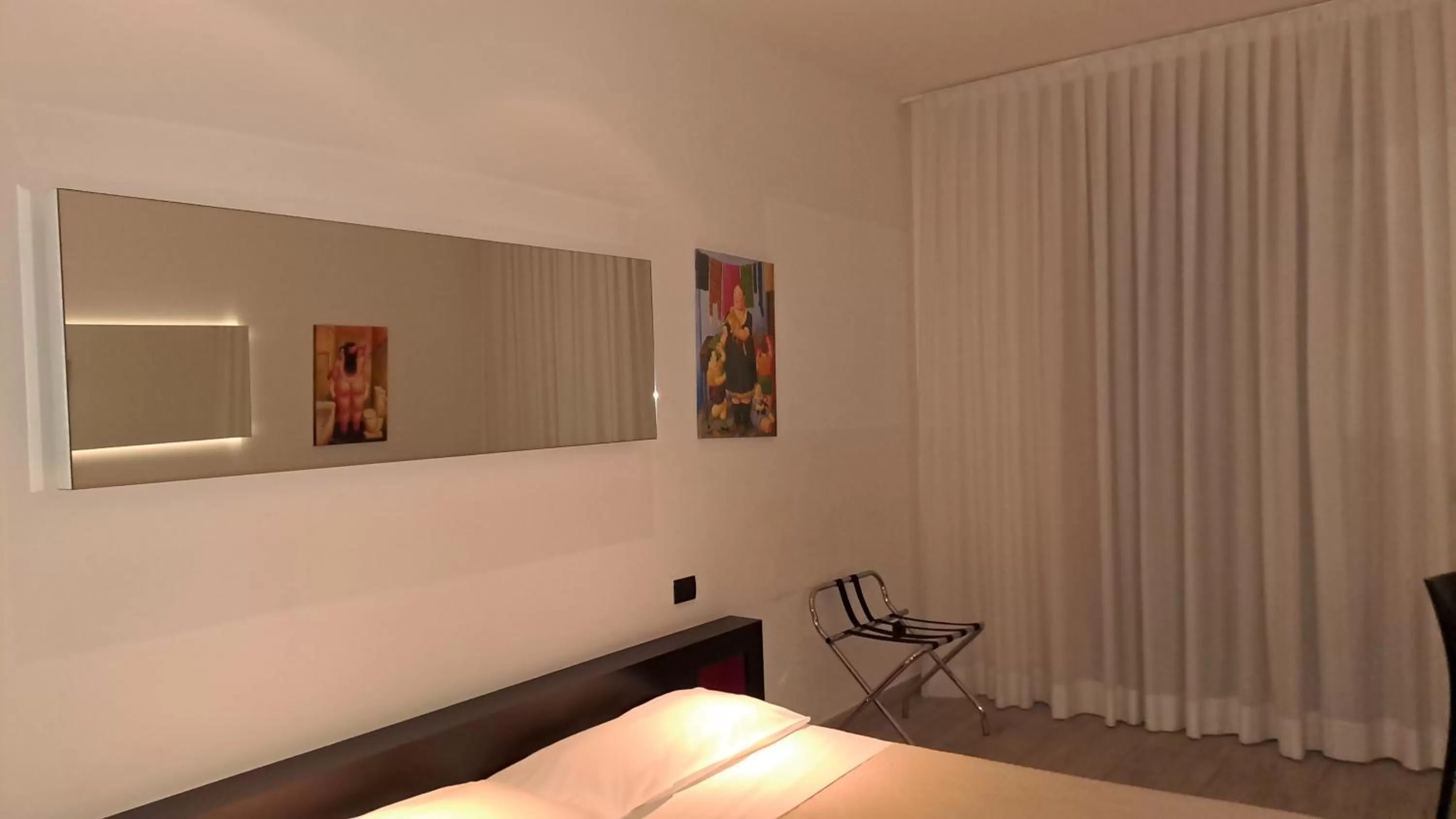 Bed in Blue Shades Hotel