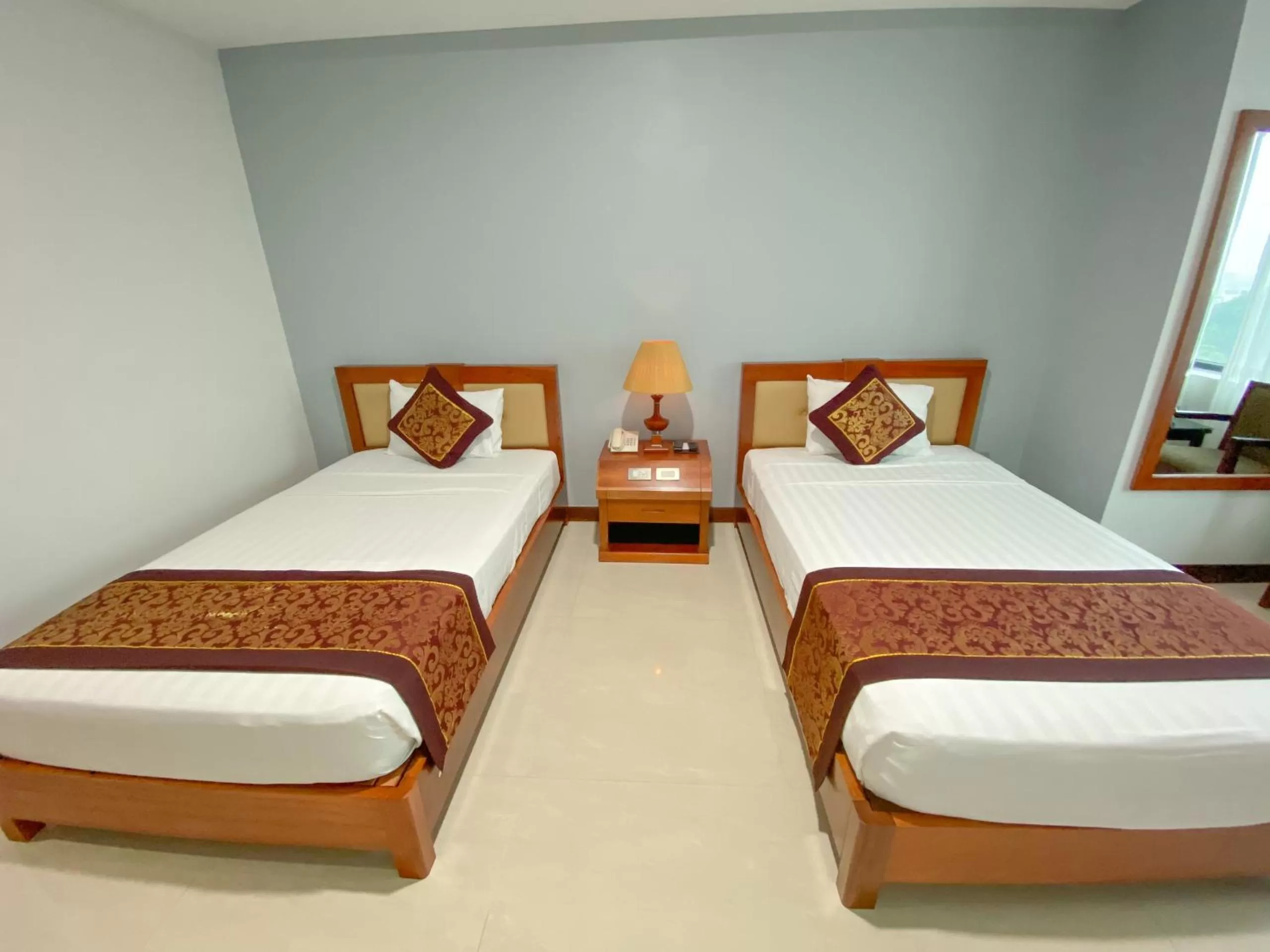 Bed in Kim Thai Hotel