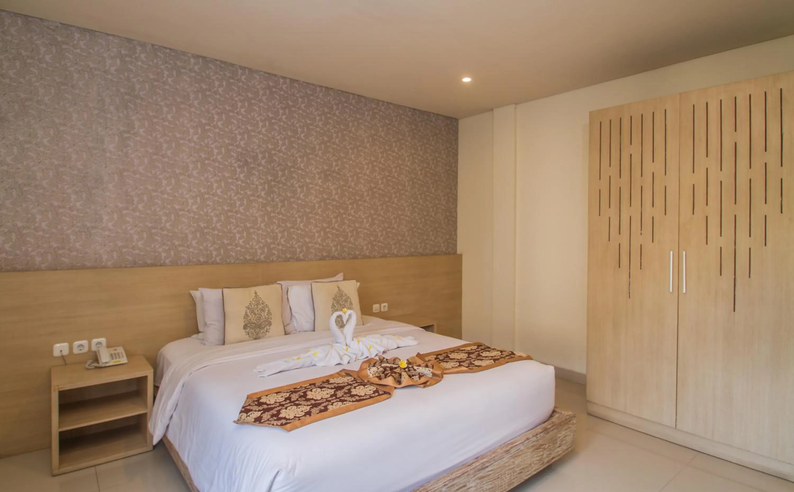 Bed in Mahalaksmi Boutique Hotel