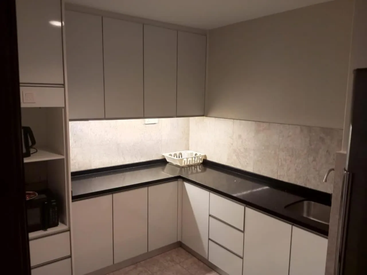Kitchen or kitchenette in Serviced Apartments at Times Square Kuala Lumpur by Robinsons