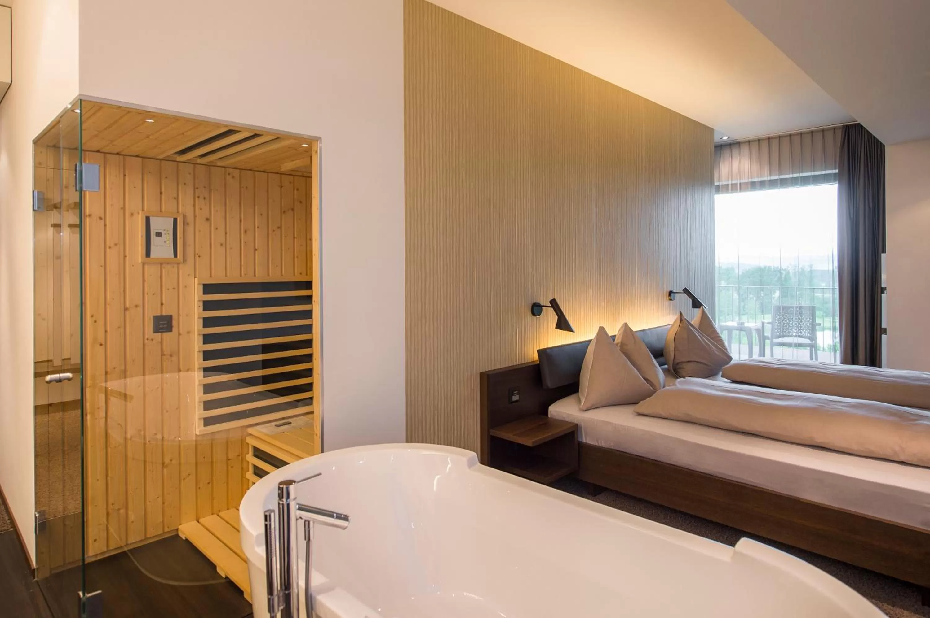 Photo of the whole room, Bed in Wellnesshotel Golfpanorama