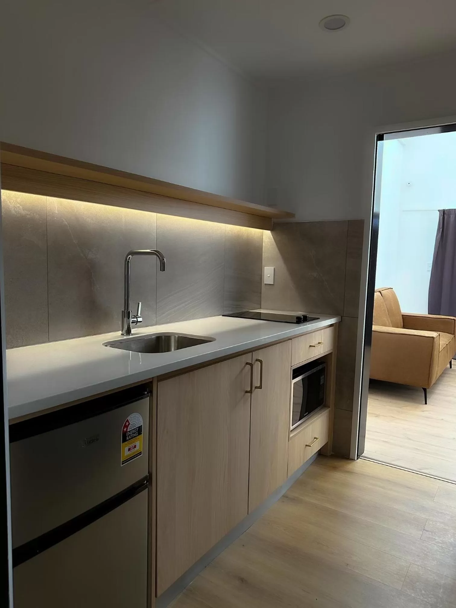 Kitchen or kitchenette in Burwood Motel