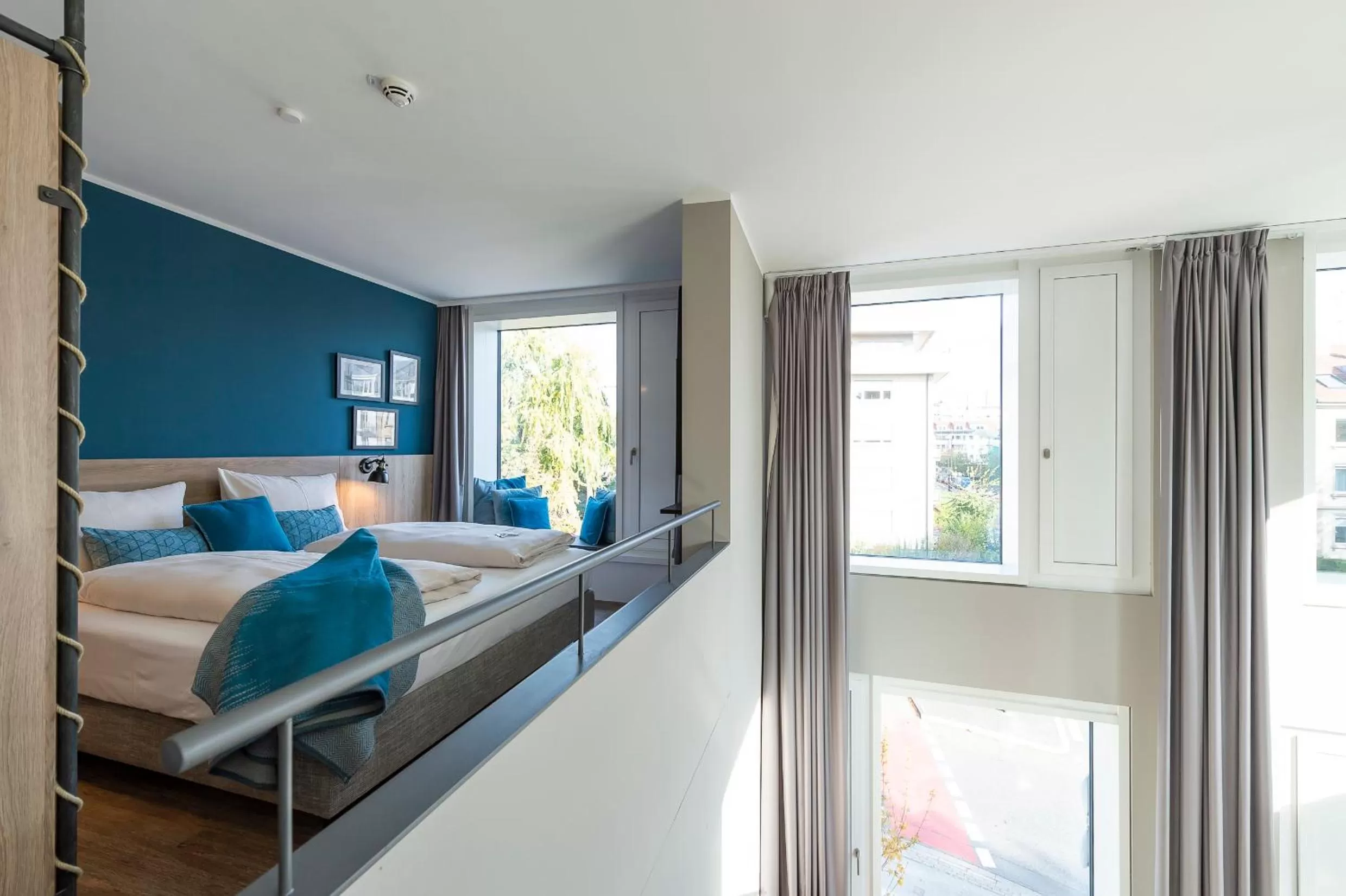 Bed in HARBR Hotel Konstanz, a member of Radisson Individuals