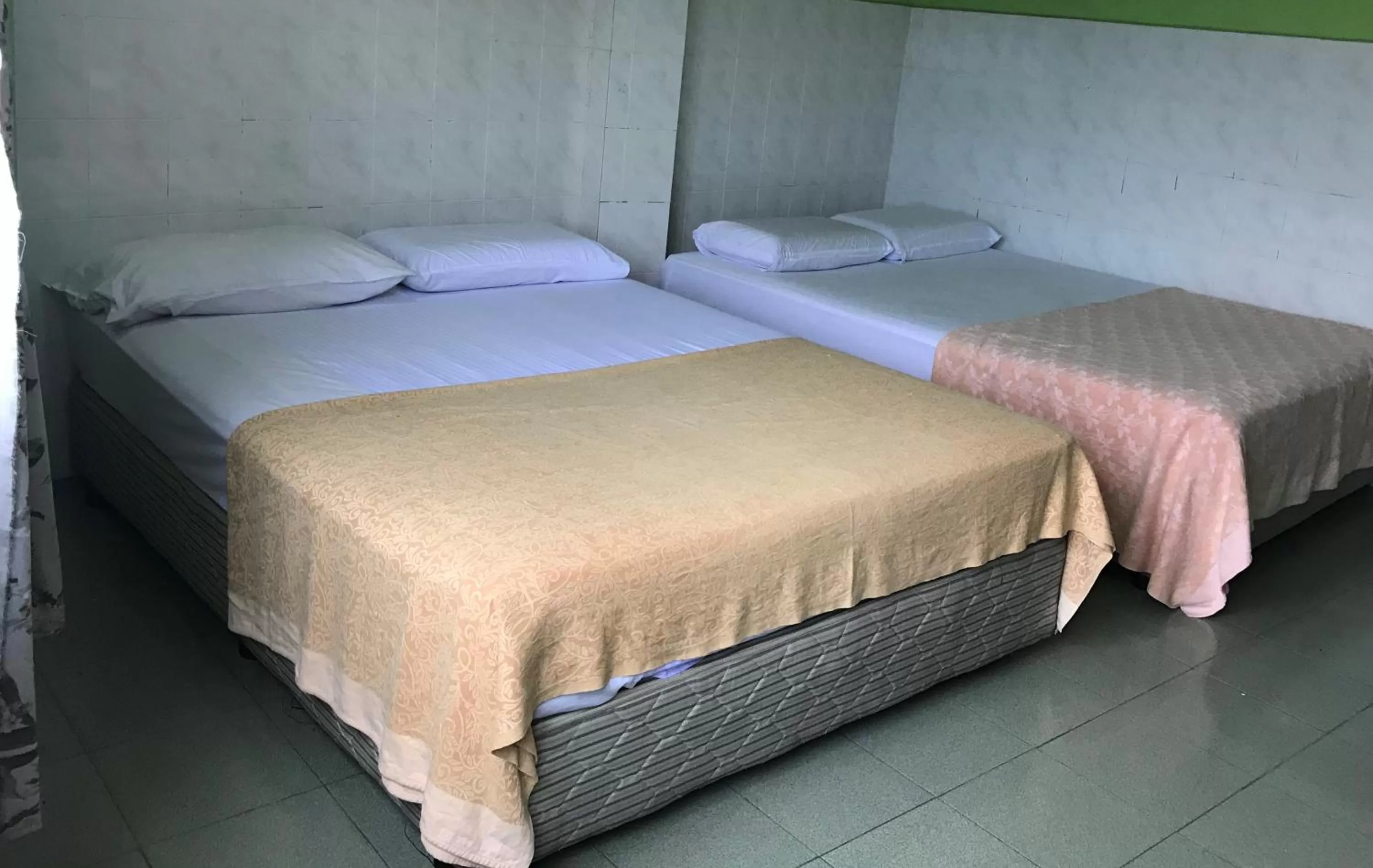Bed in Hotel Cahaya