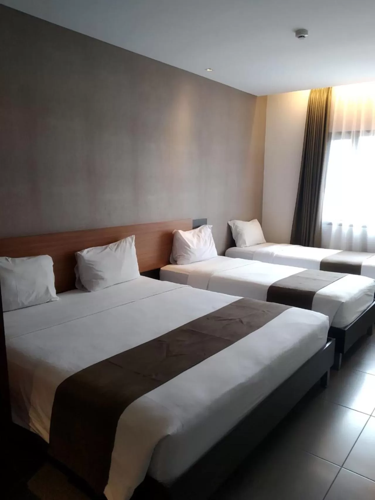 Bed in Sukajadi Hotel, Convention and Gallery