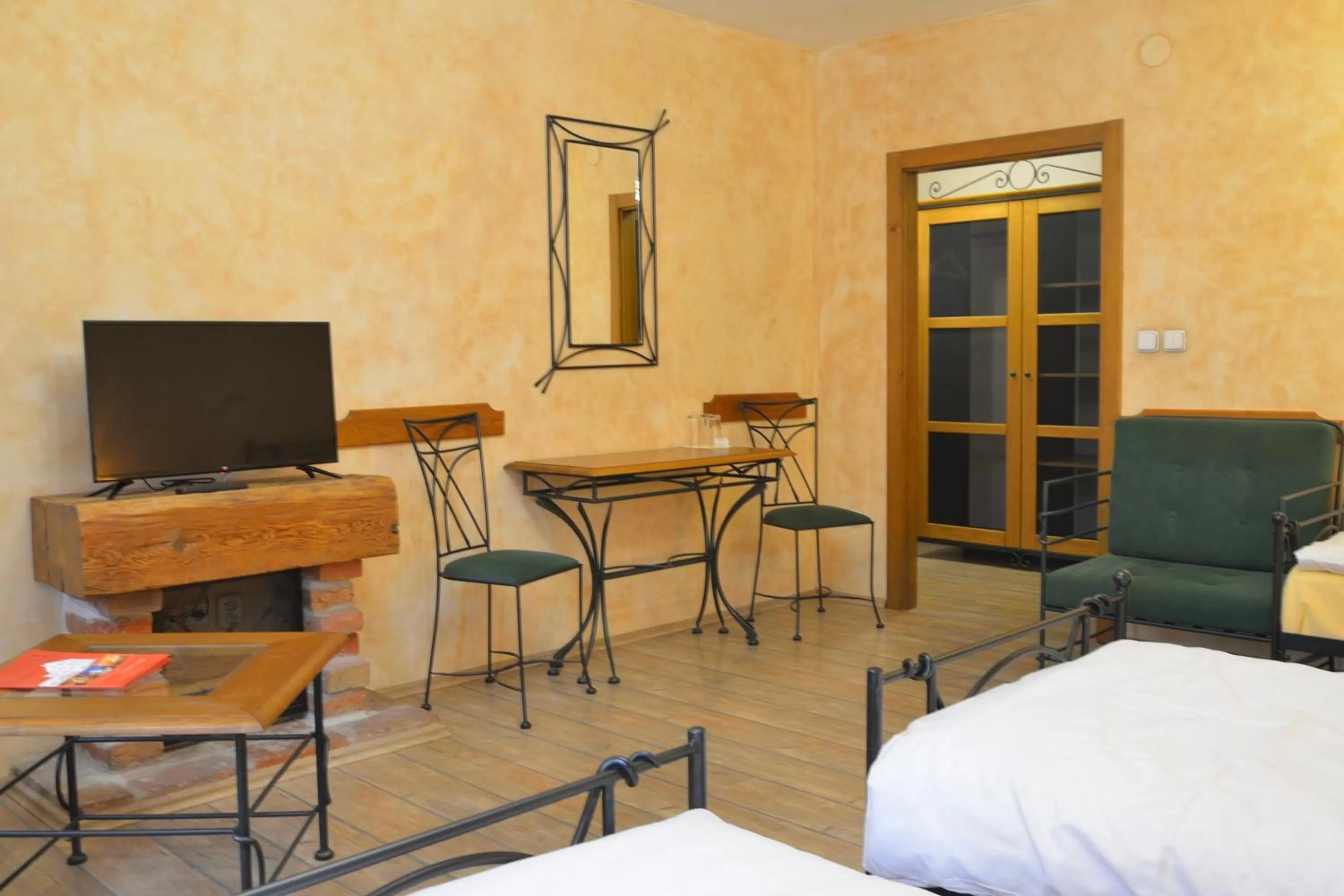 TV/Entertainment Center in Hotel and restaurant Via Ironia