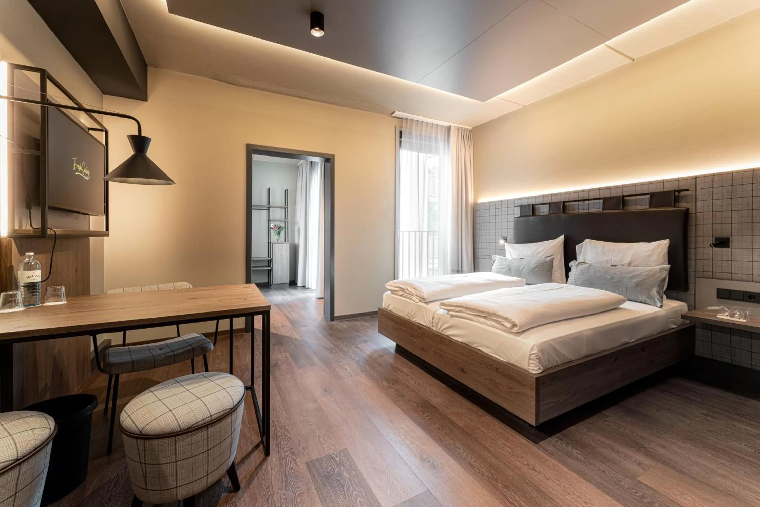 Photo of the whole room, Bed in FreshSuites & Bar