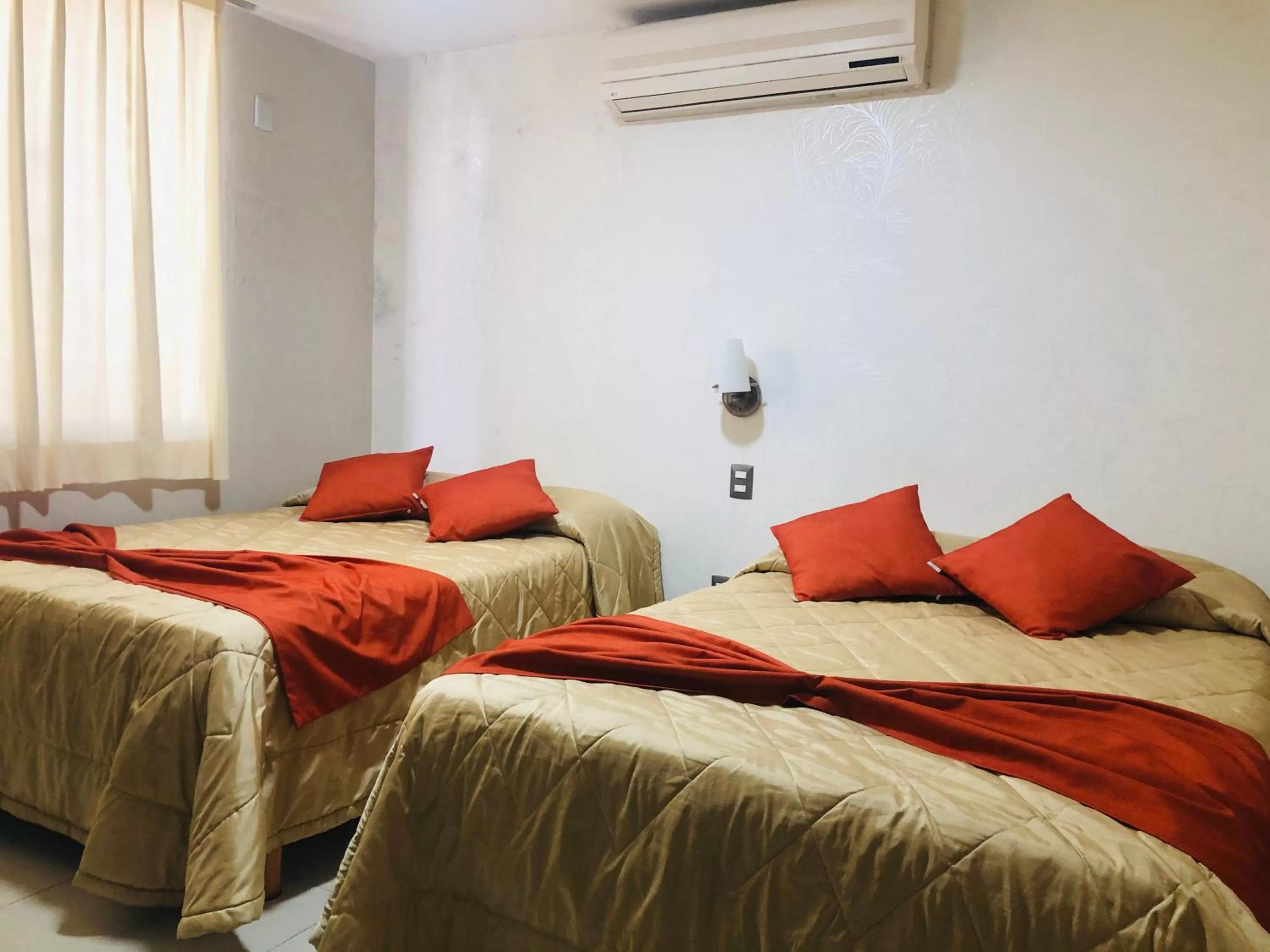 Bedroom in Suites San Luis