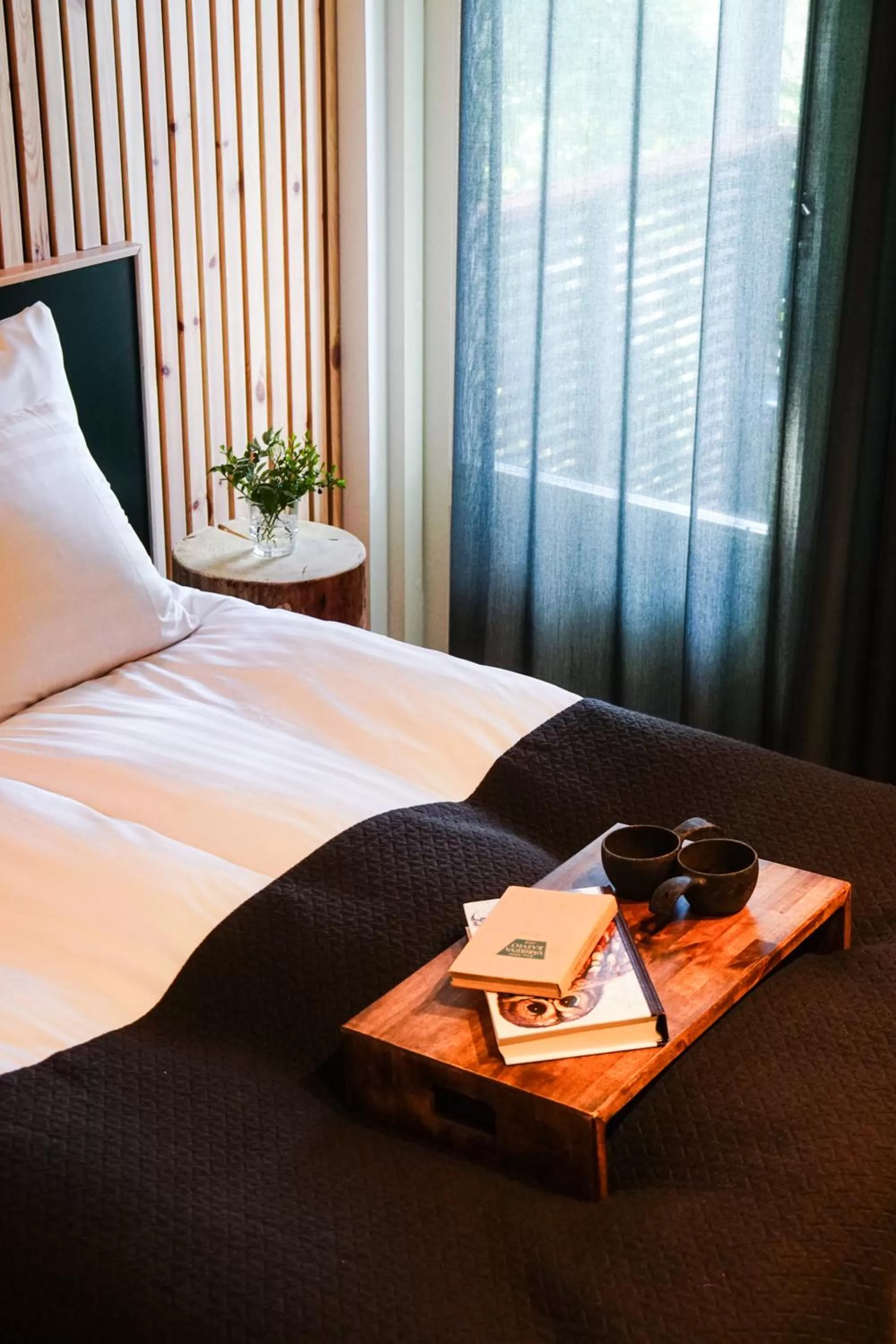 Bed in Haltia Lake Lodge nature boutique hotel & glamping