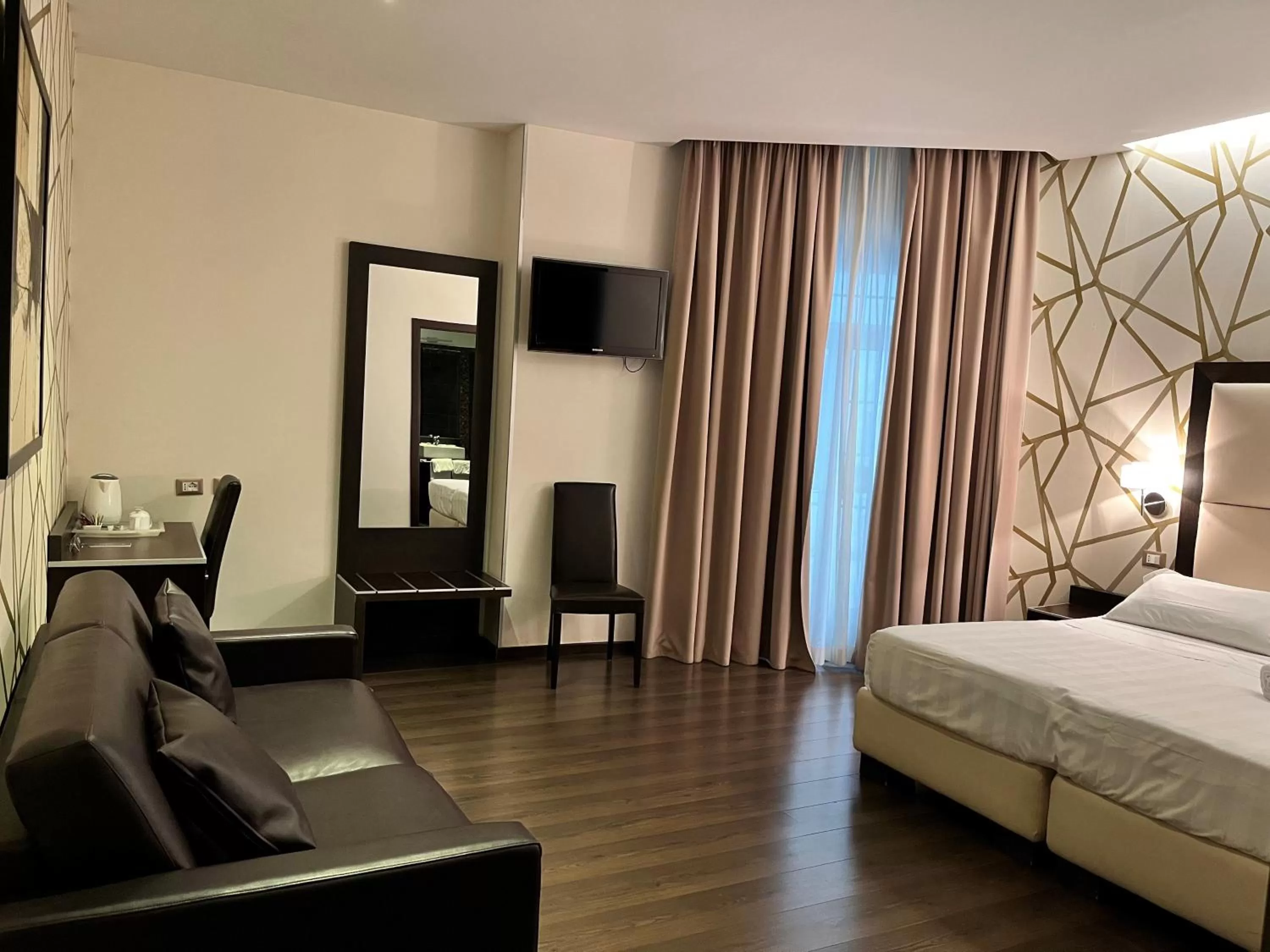 Photo of the whole room, Bed in Catone District Hotel