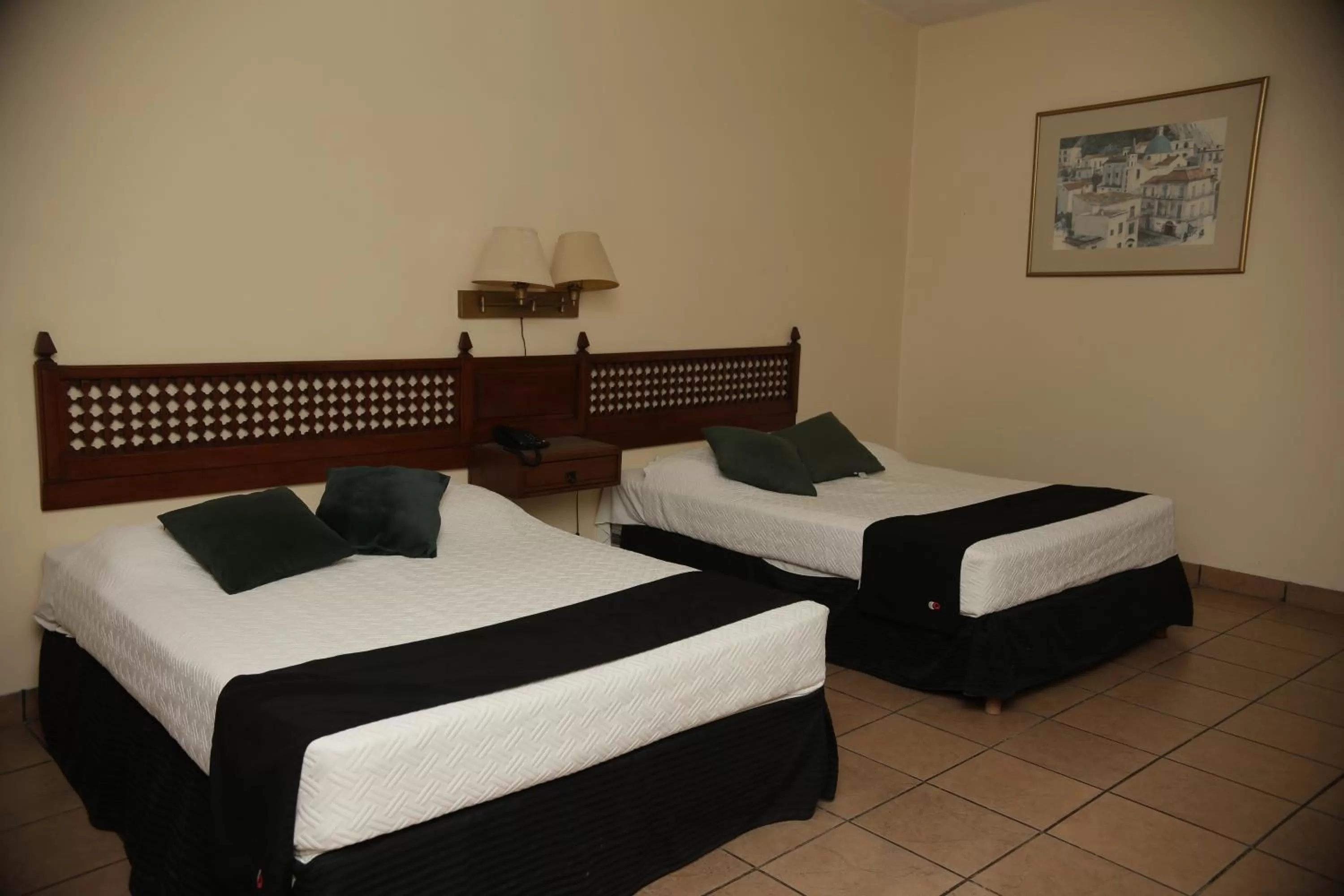 Bed in Hotel Posada Santa Fe Sabinas