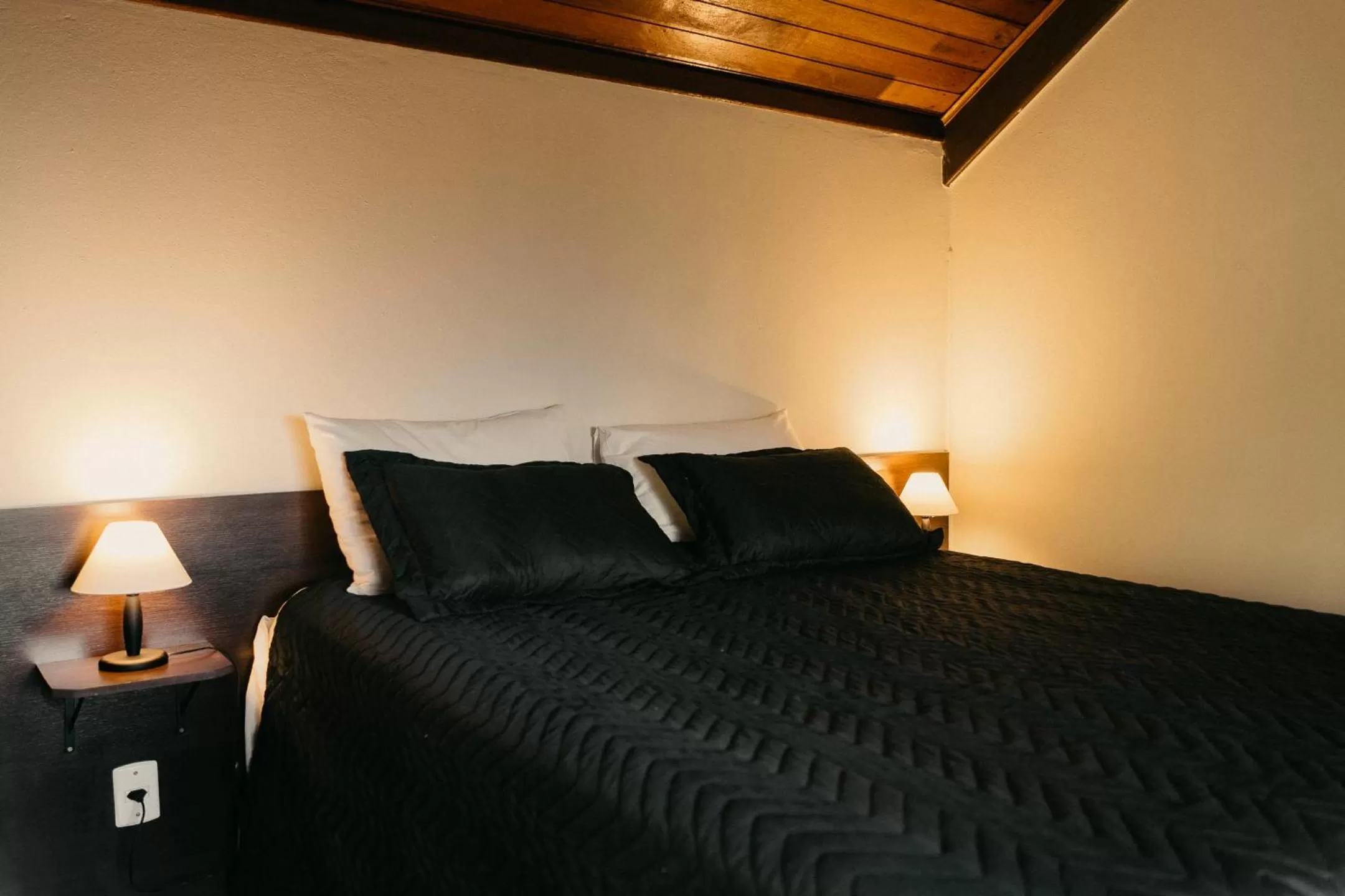 Bed in Pousada Ilha da Magia