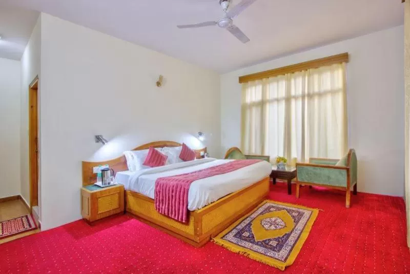 Photo of the whole room, Bed in Ayushman Hotels