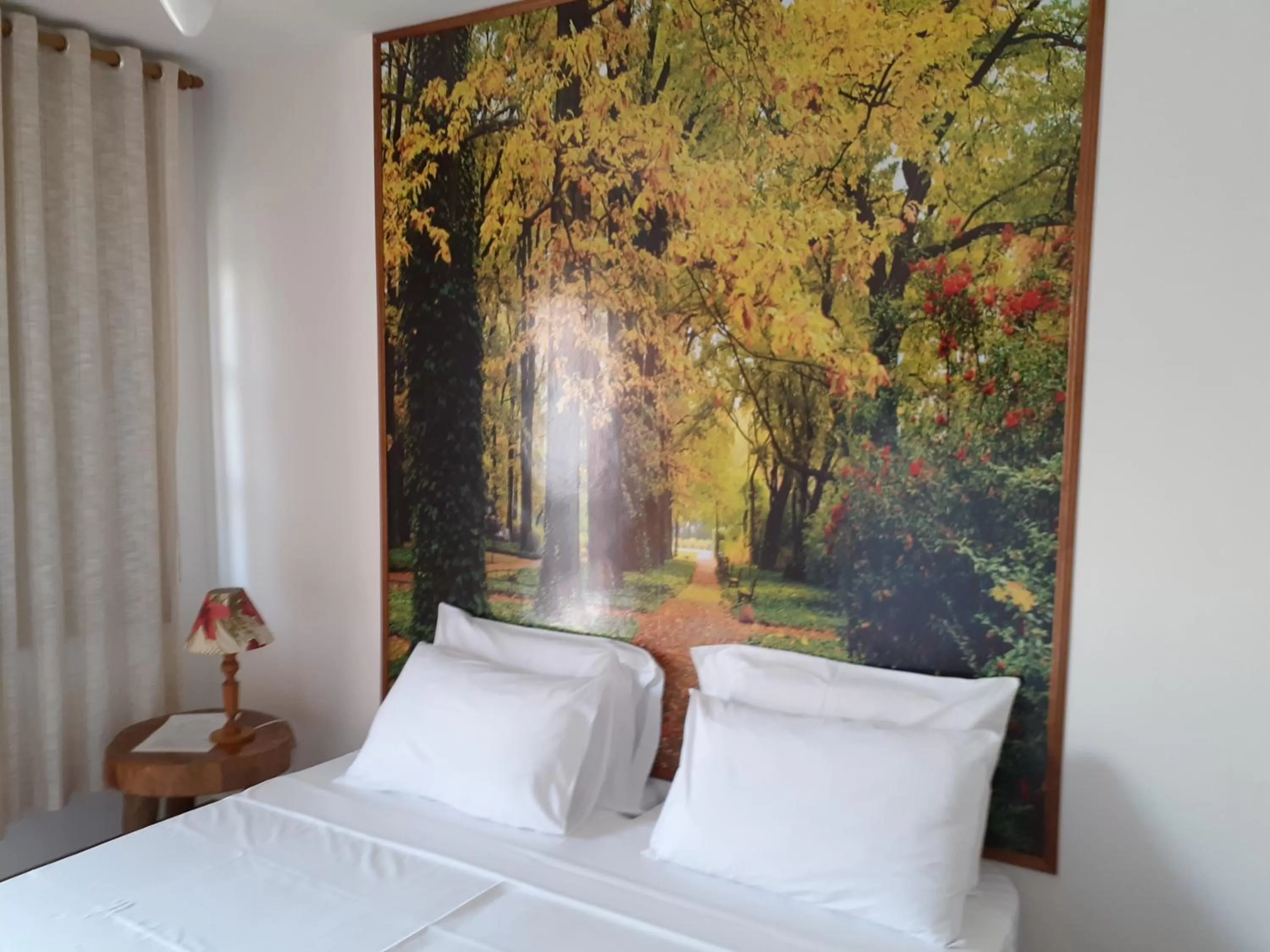 Bed in Pousada R.N.C. Nosso Paraíso