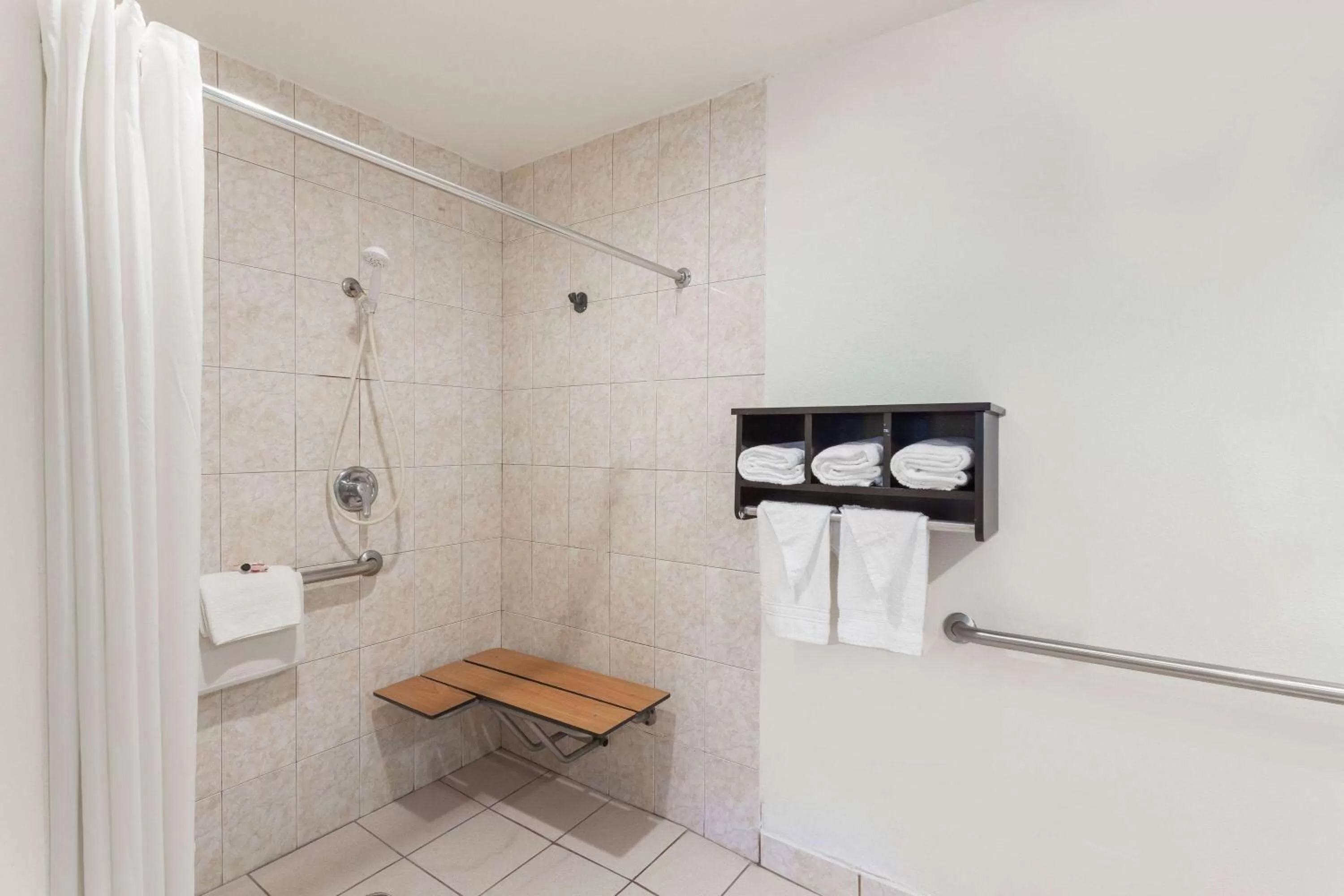 Shower in Howard Johnson by Wyndham National City/San Diego South