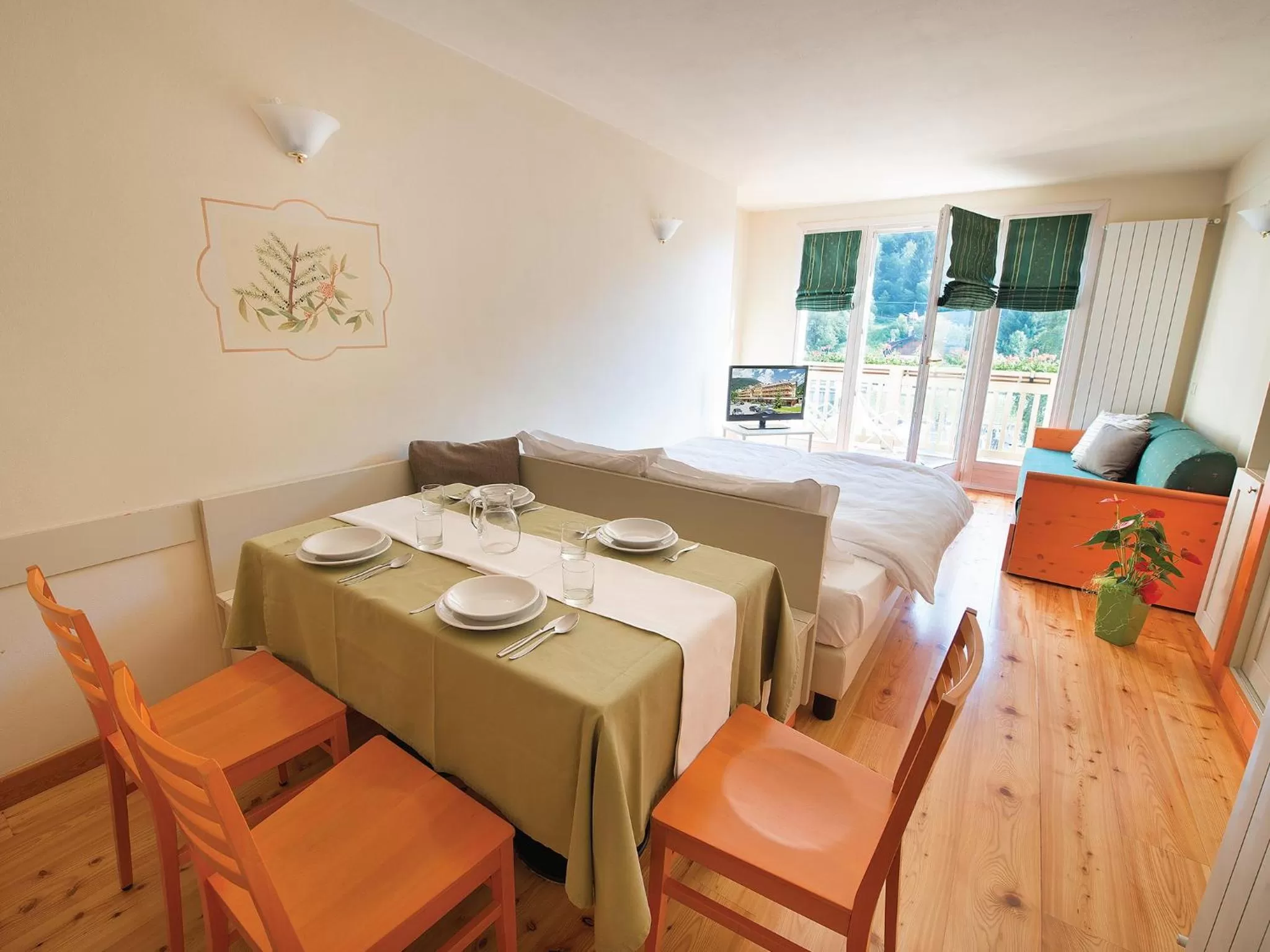 Bed, Dining Area in Residence Club Ponte Di Legno