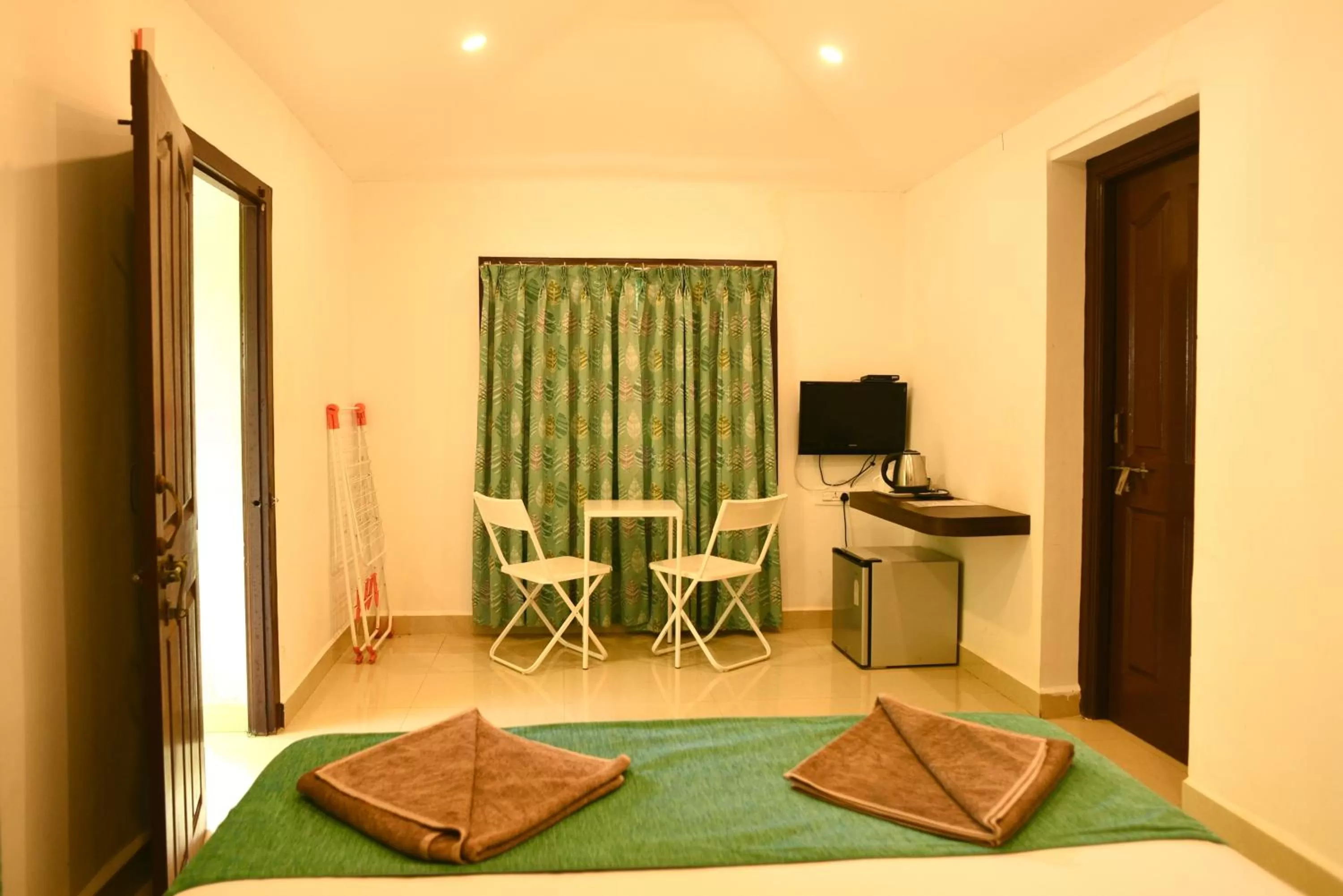 Bed, TV/Entertainment Center in Red Earth - Gokarna
