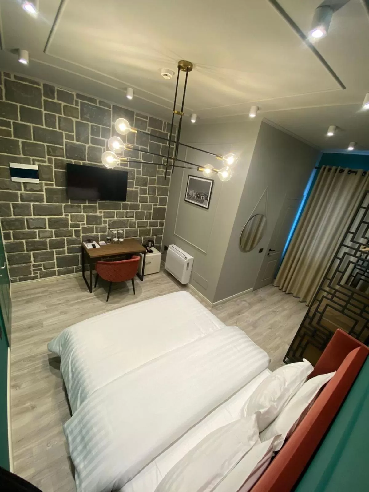 Bed in Ardenica Boutique Hotel