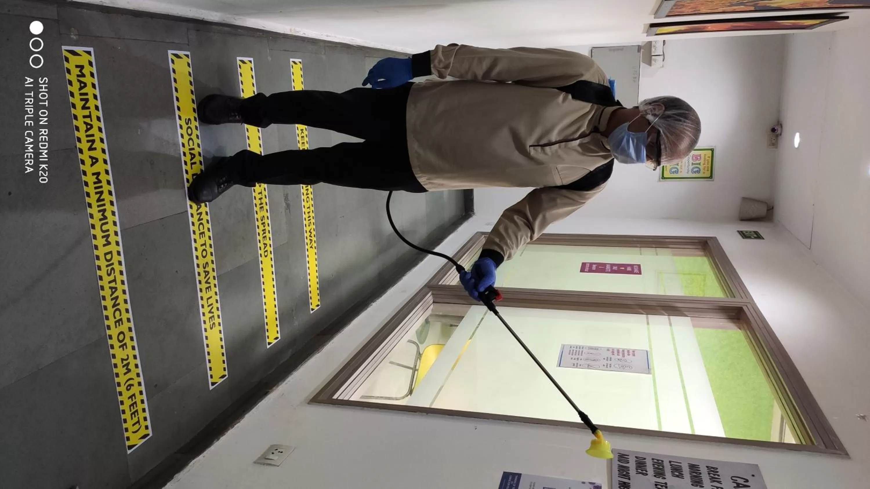 Staff in The Ashtan Sarovar Portico