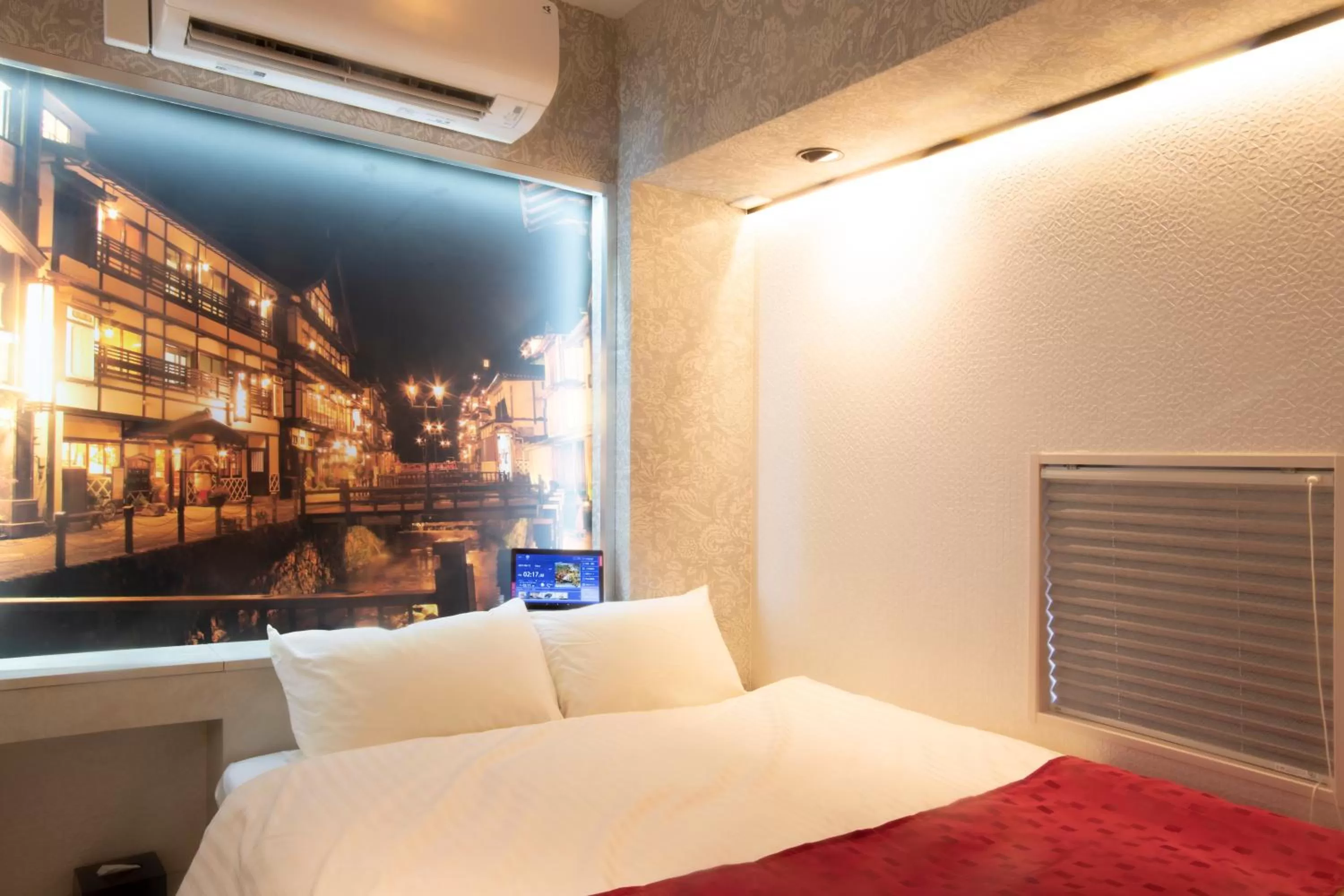 Photo of the whole room, Bed in Pinpon Hotel Hiroshima