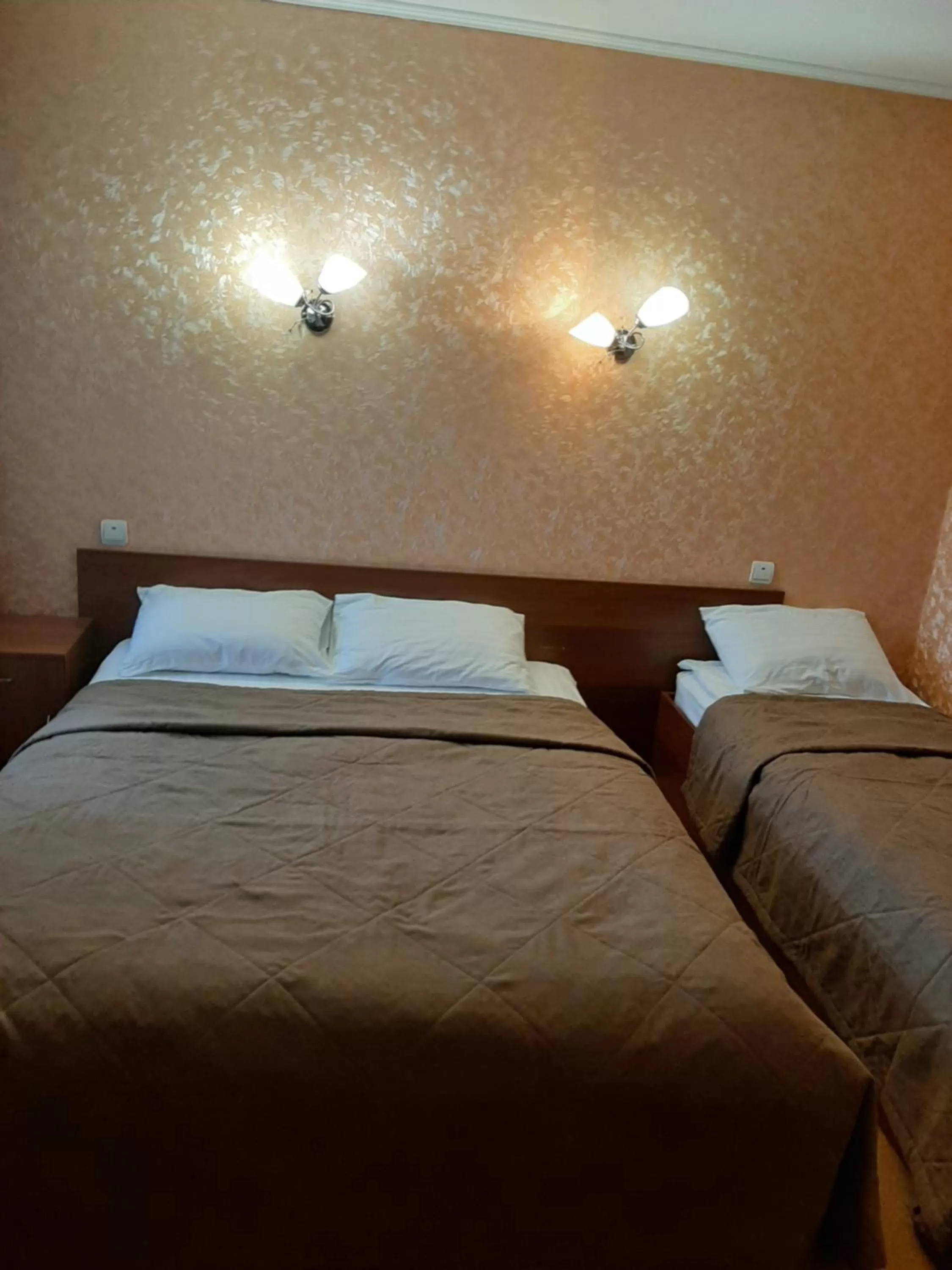 Bed in Stara Vezha Hotel