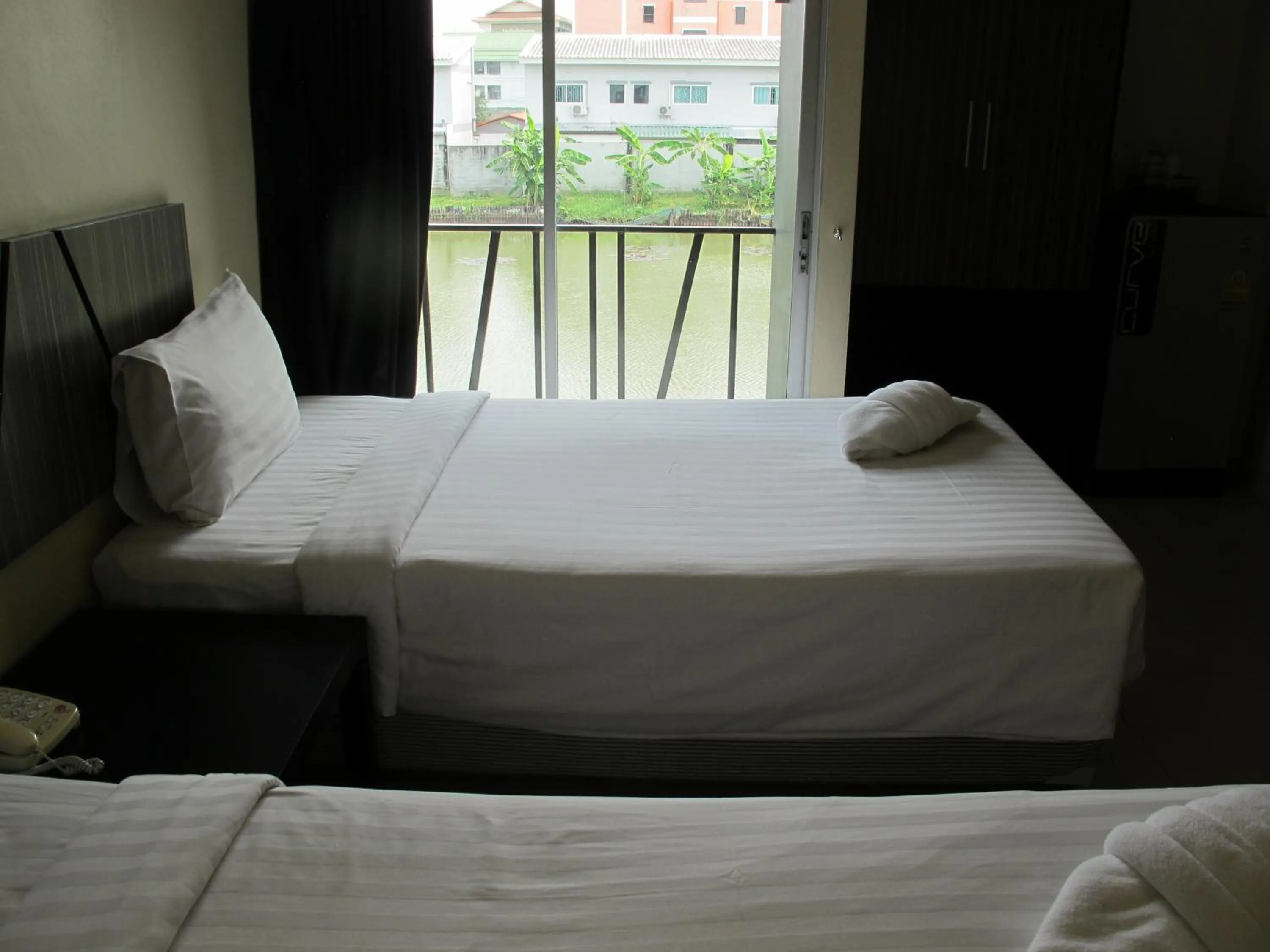Bed in AIRY Suvarnabhumi Hotel