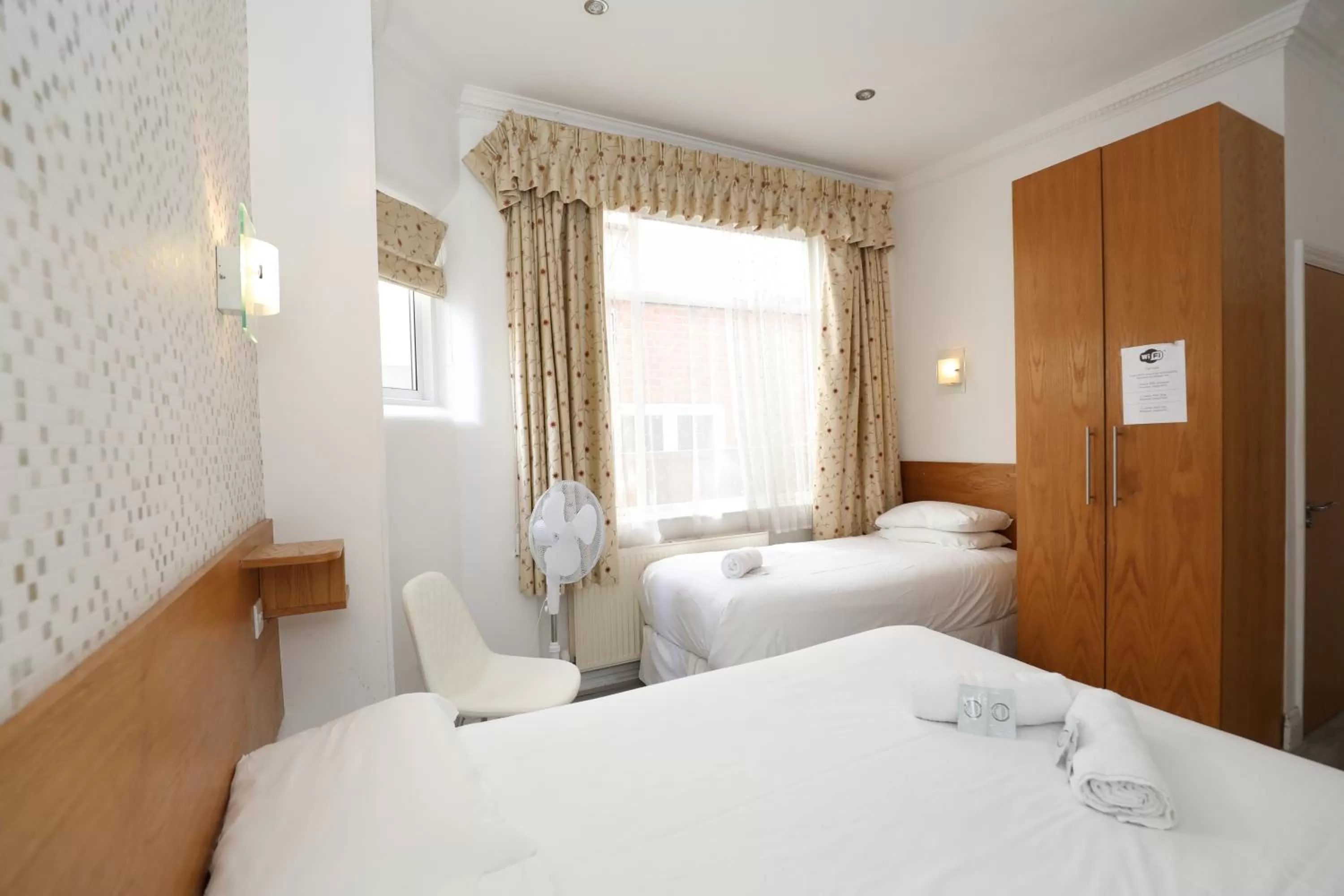 Bed in Anchor Guest House