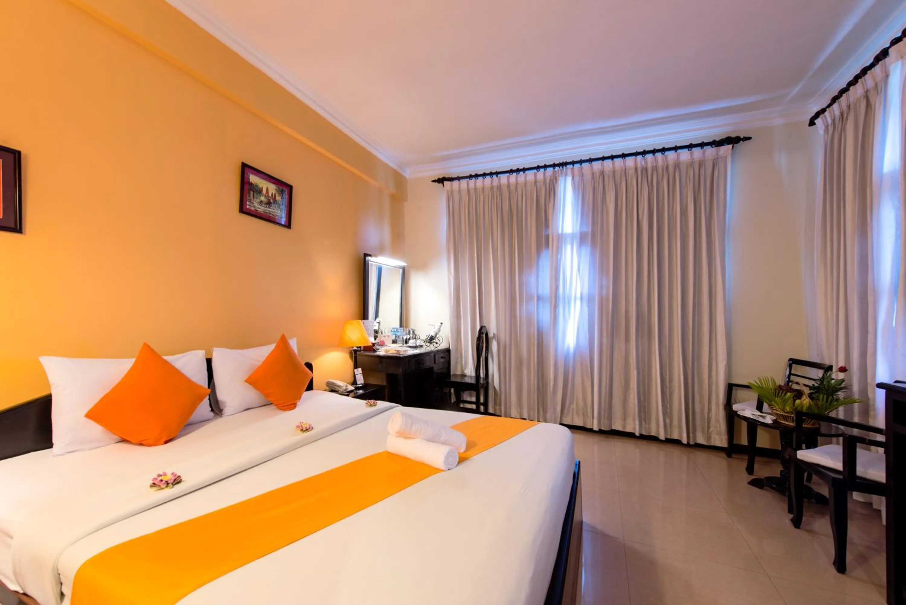 Photo of the whole room, Bed in Angkor Panoramic Boutique Hotel