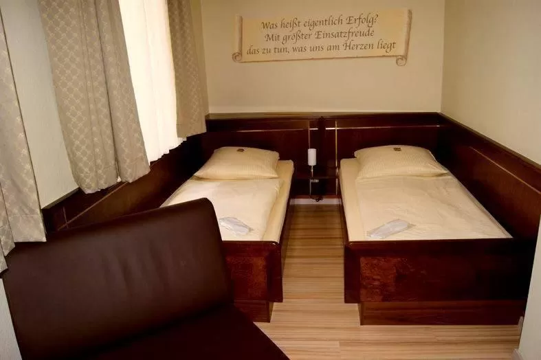 Bed in Hotel am Wilhelmsplatz