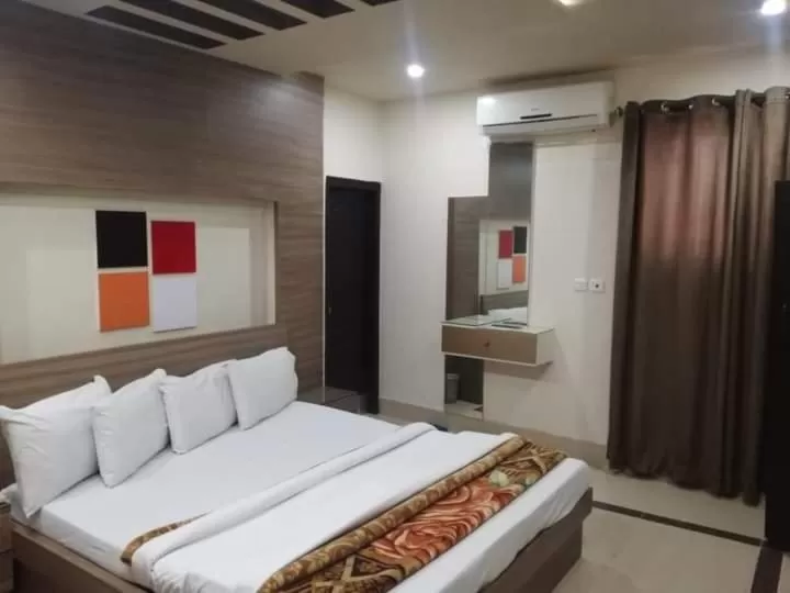 Bed in Hotel Grace inn