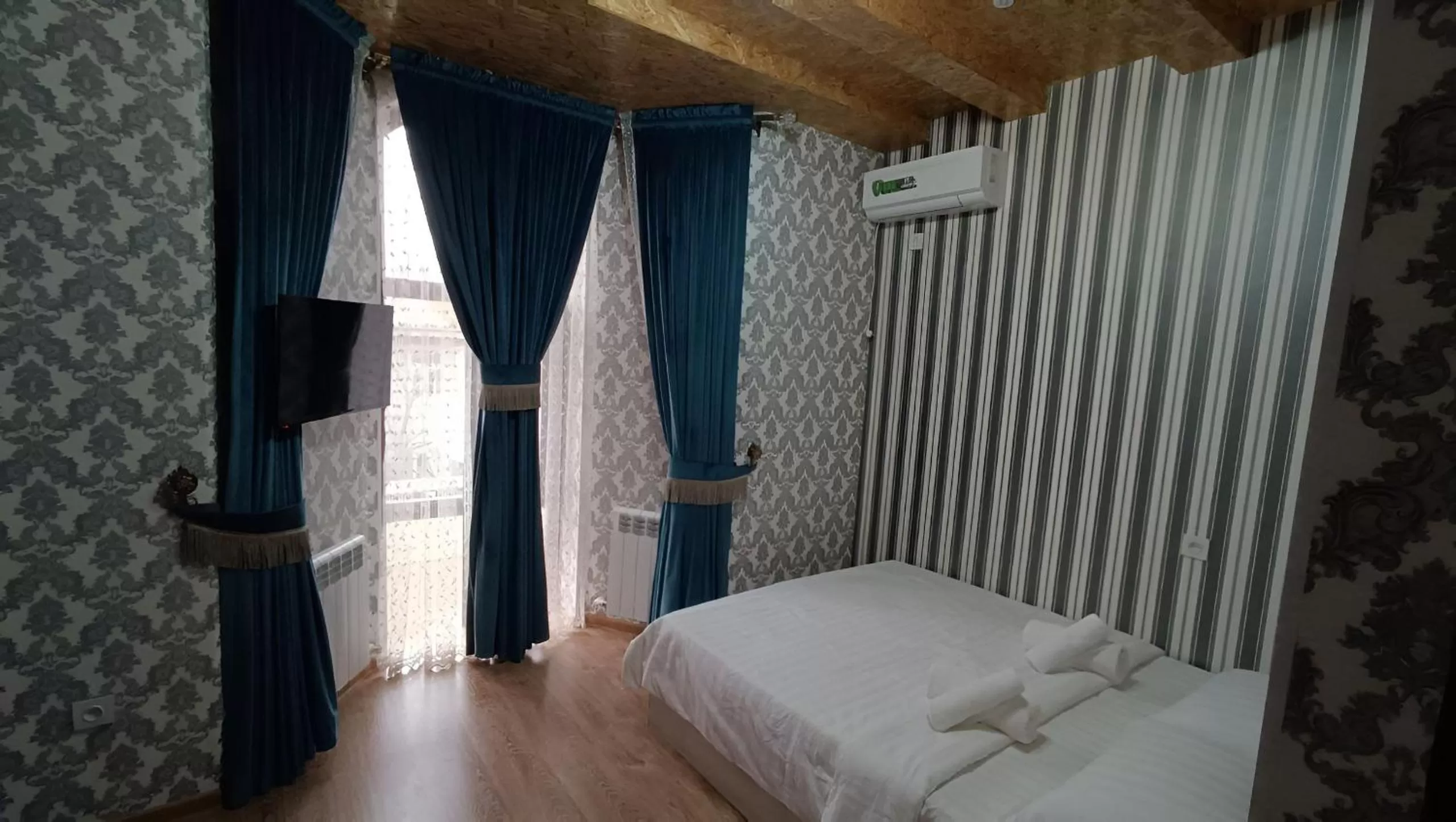 Bed in Aminabonu Hotel