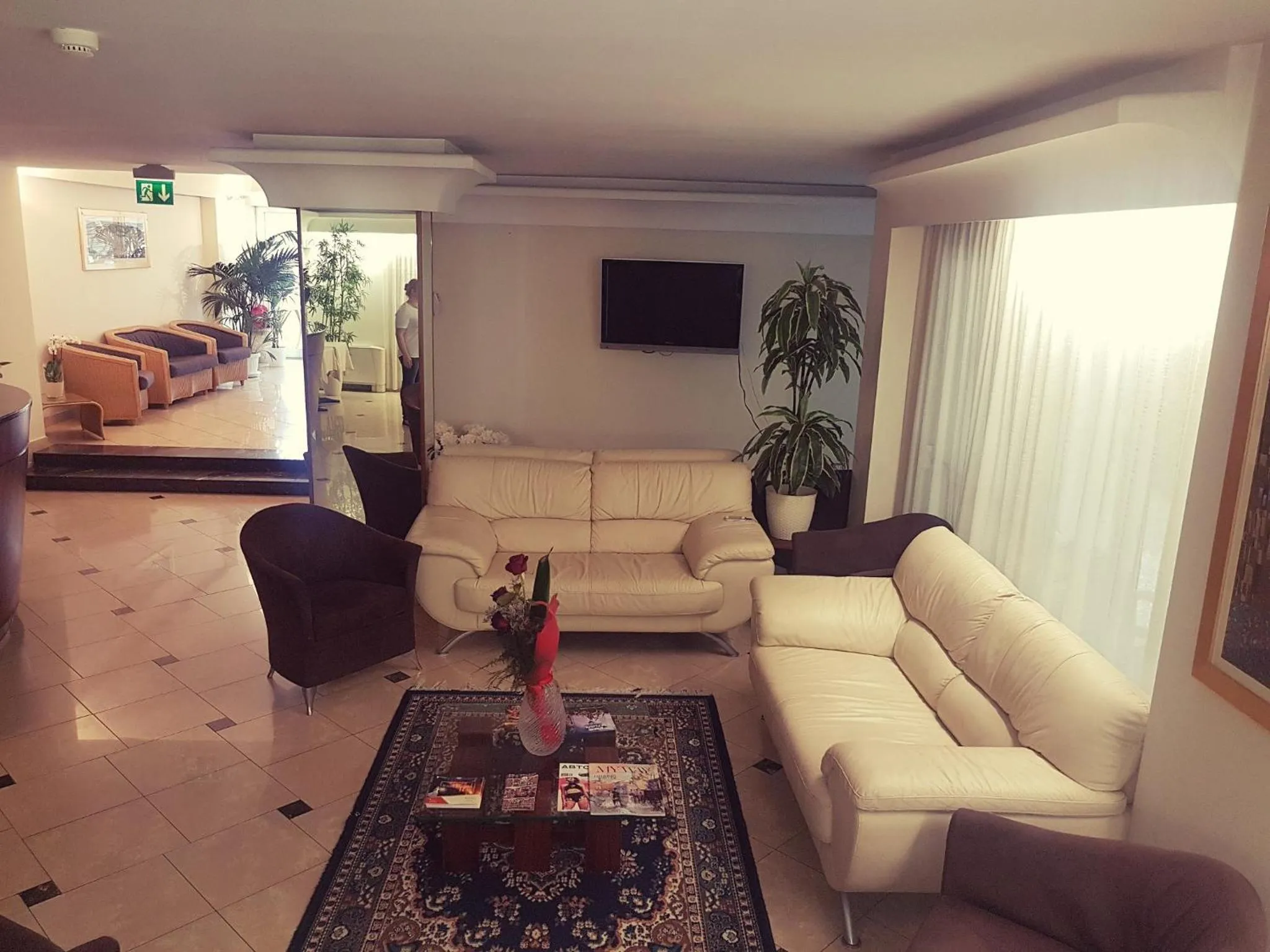 Communal lounge/ TV room in Hotel St Pierre