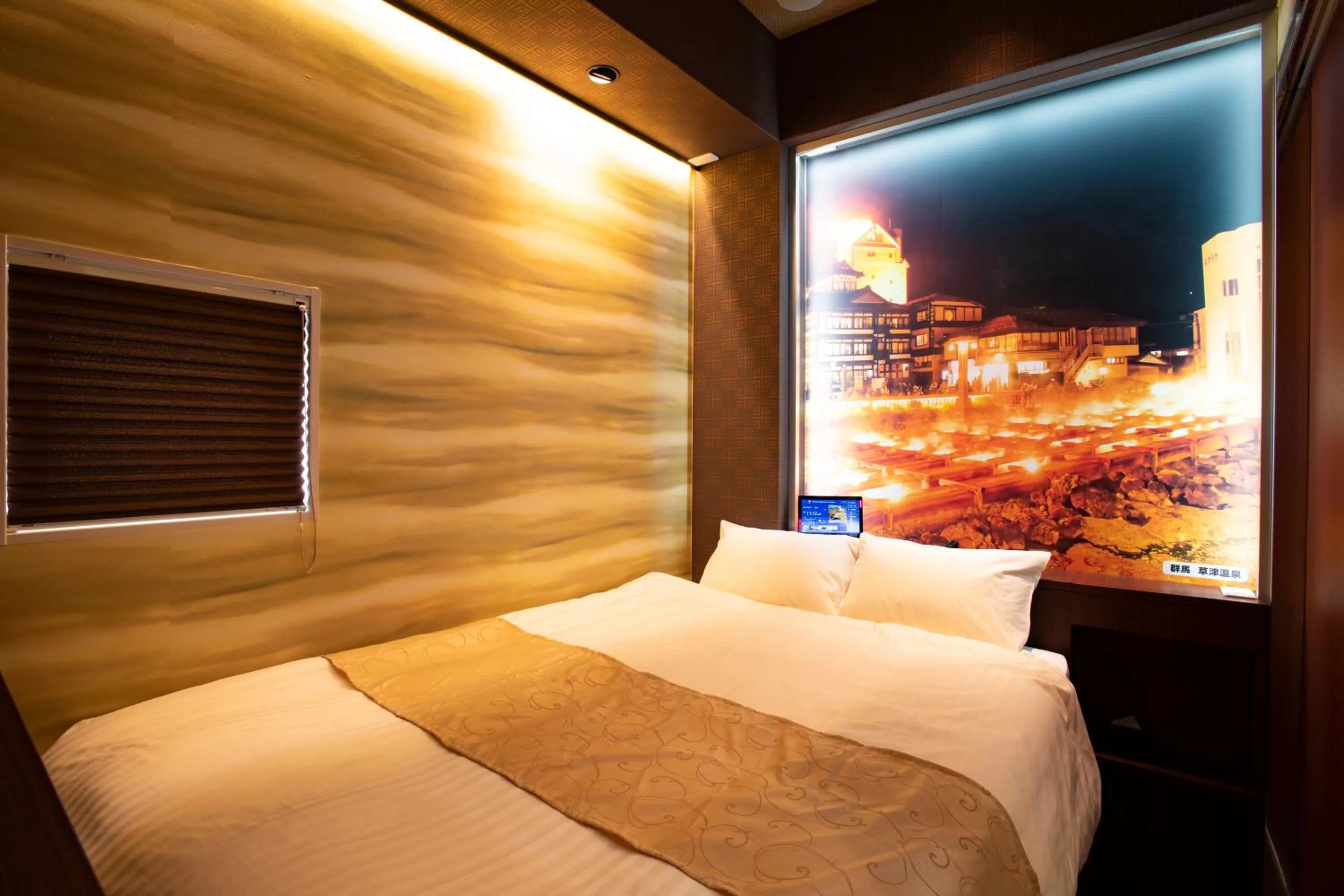 Bed in Pinpon Hotel Hiroshima