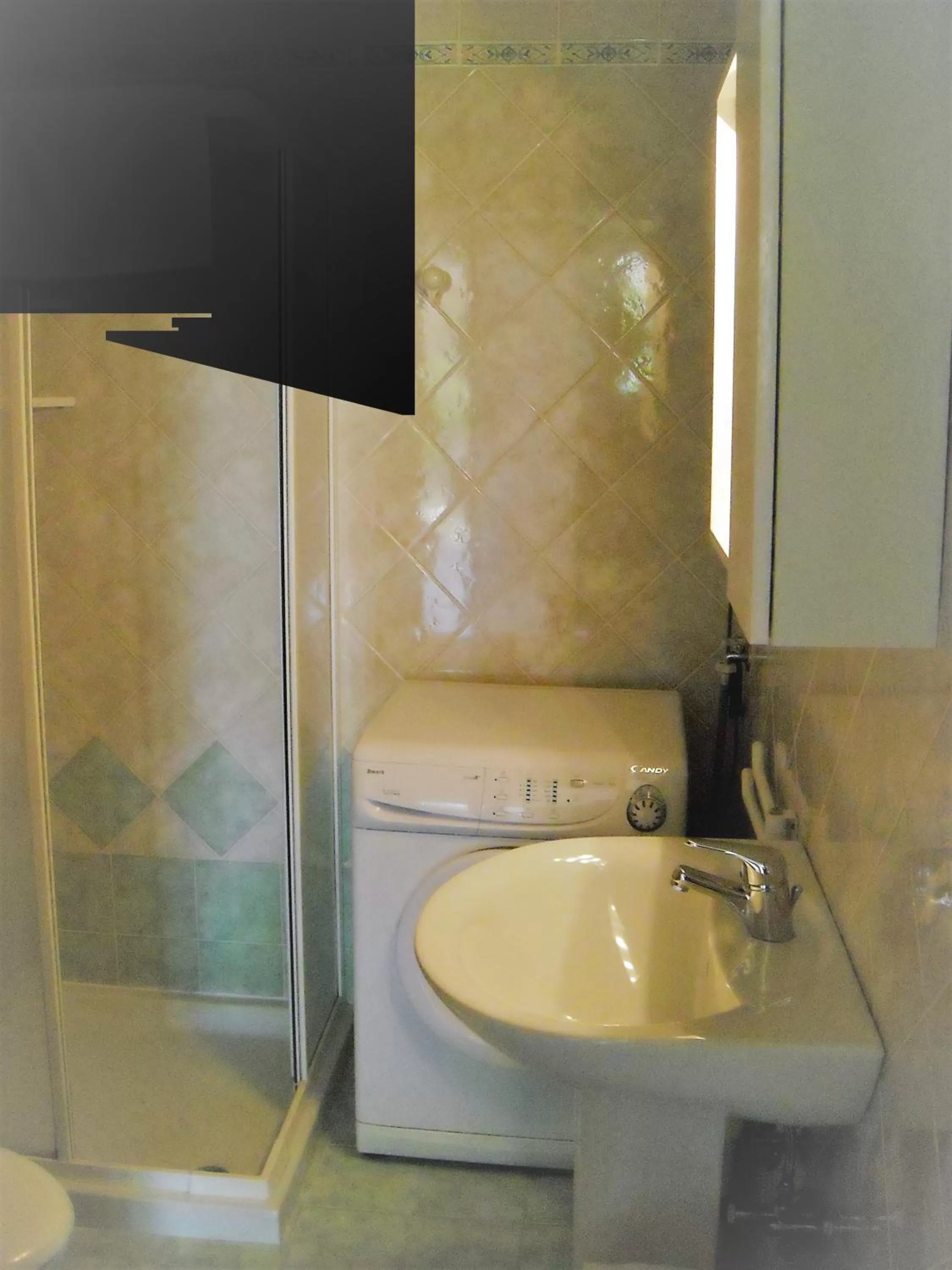 Bathroom in Villaggio dei Fiori Apart- Hotel 3 Stars - Family Resort