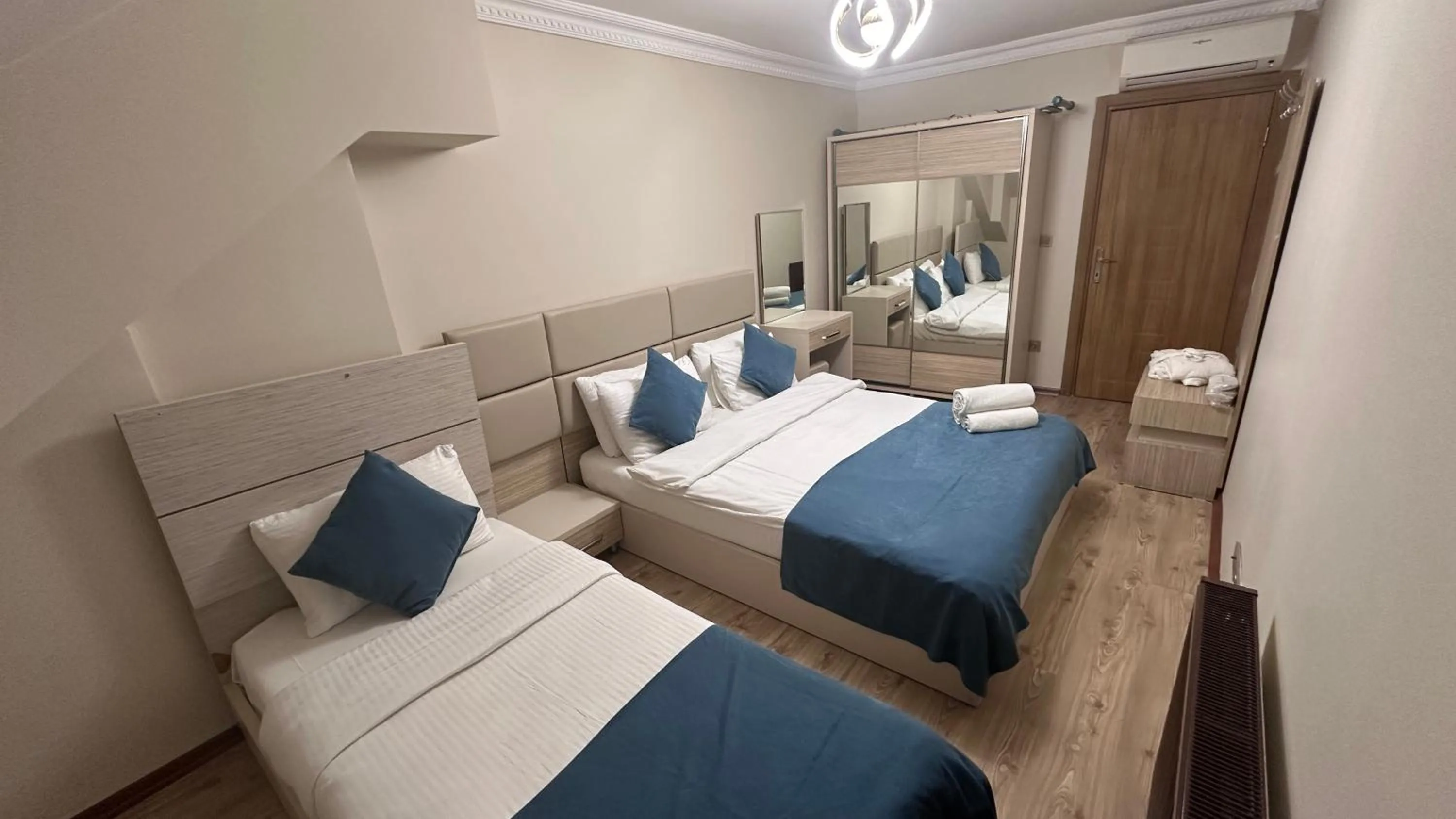 Bed in Overland Residence