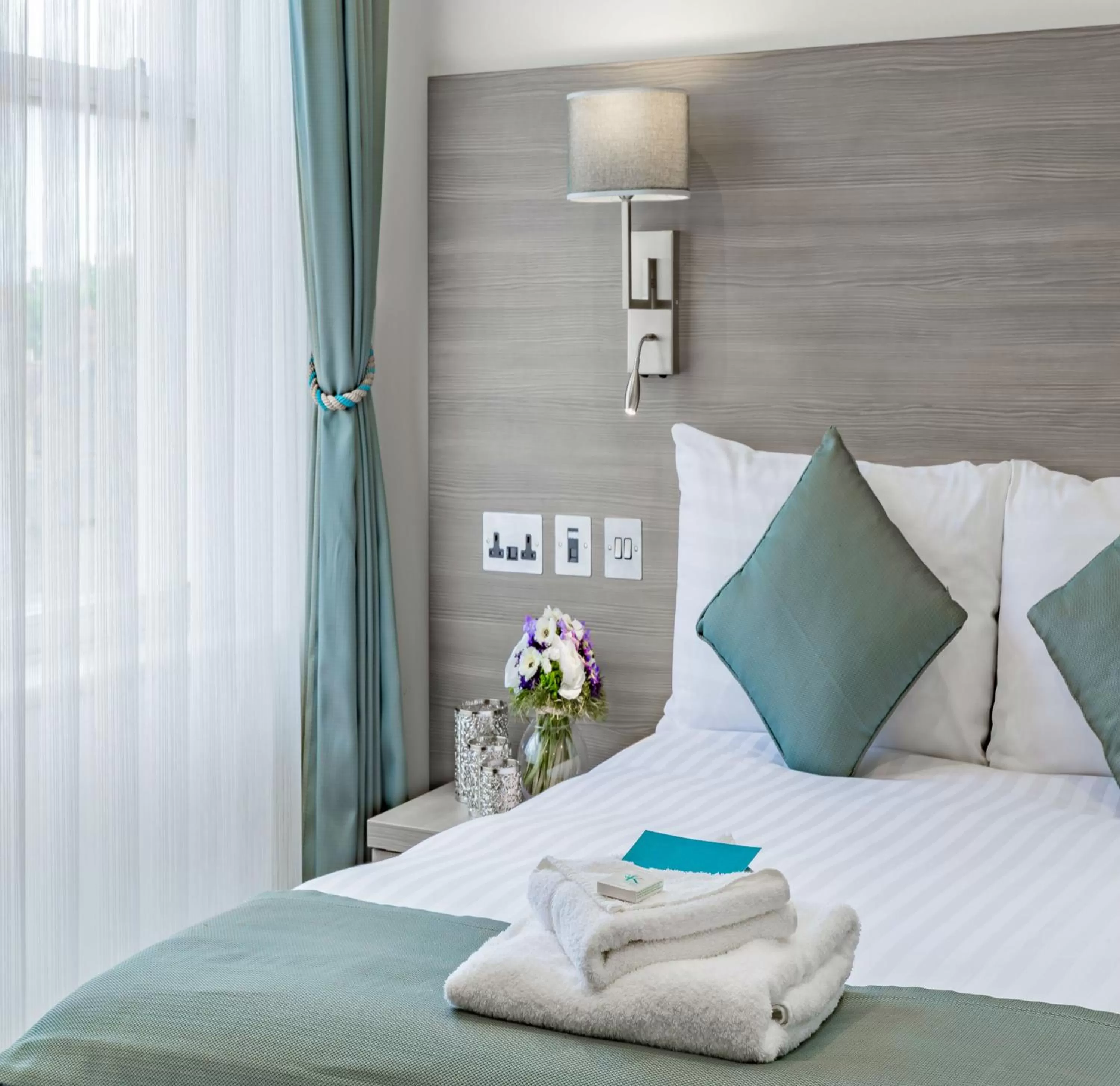 Bed in The Lion & Key Hotel