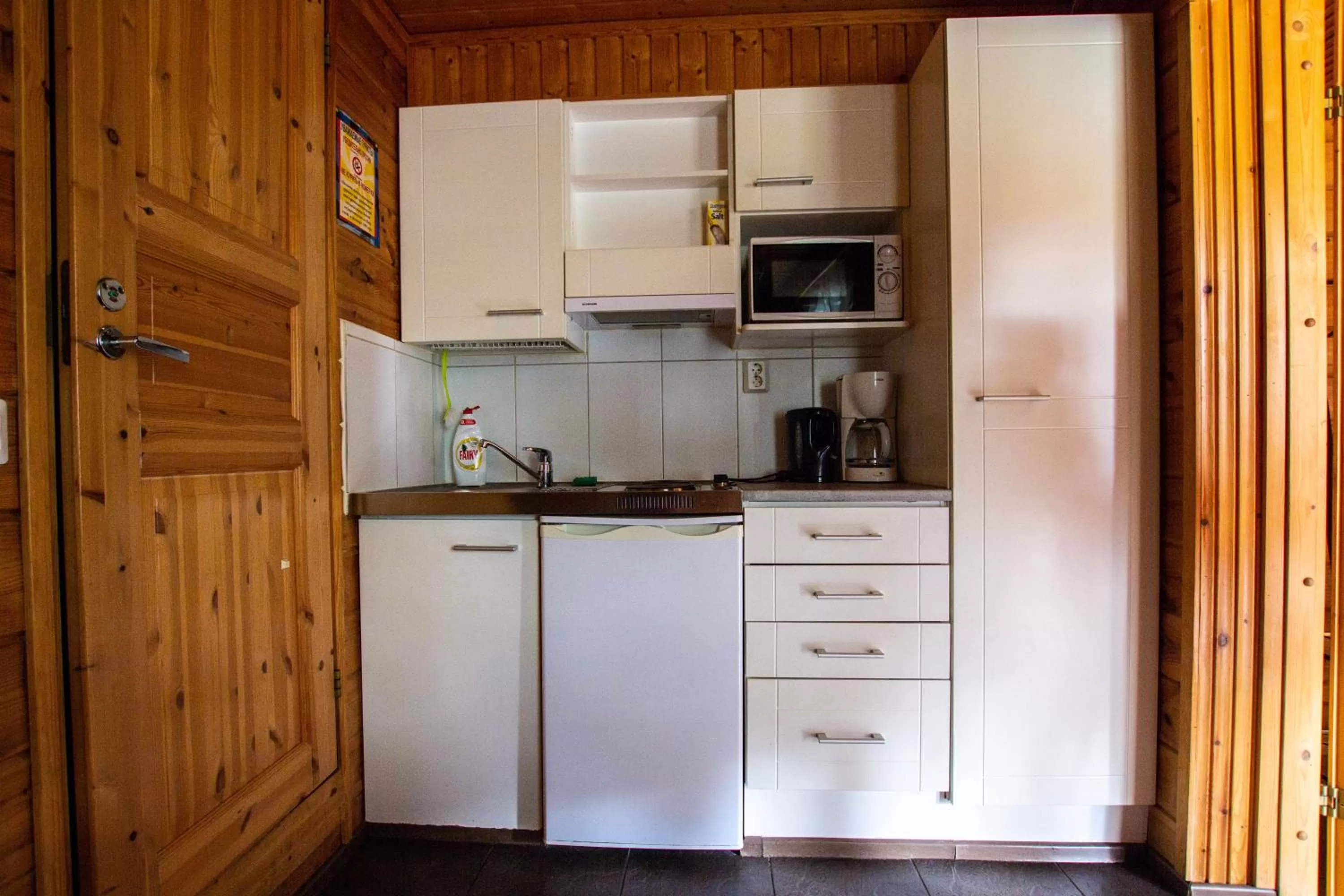 Kitchen or kitchenette in Motelli Rovaniemi