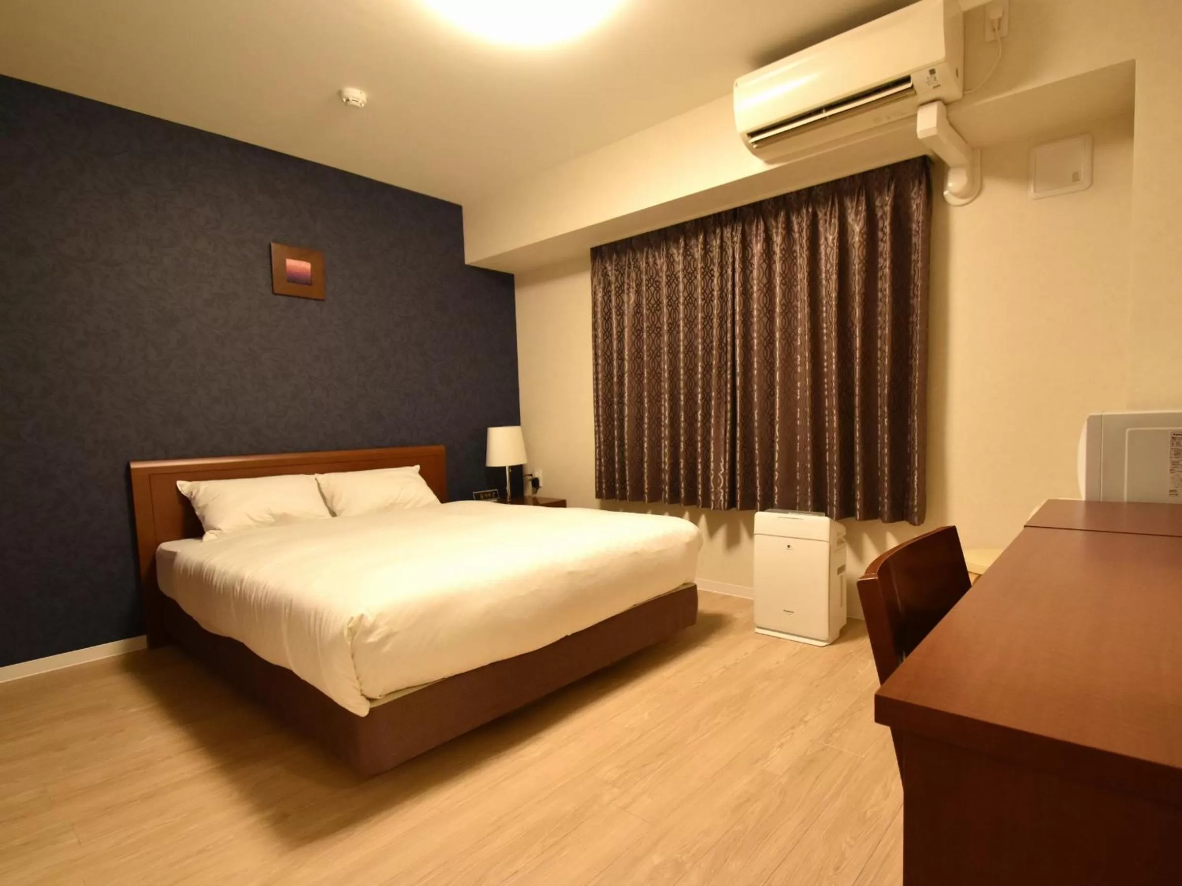 Bed in Hotel Hakata Place